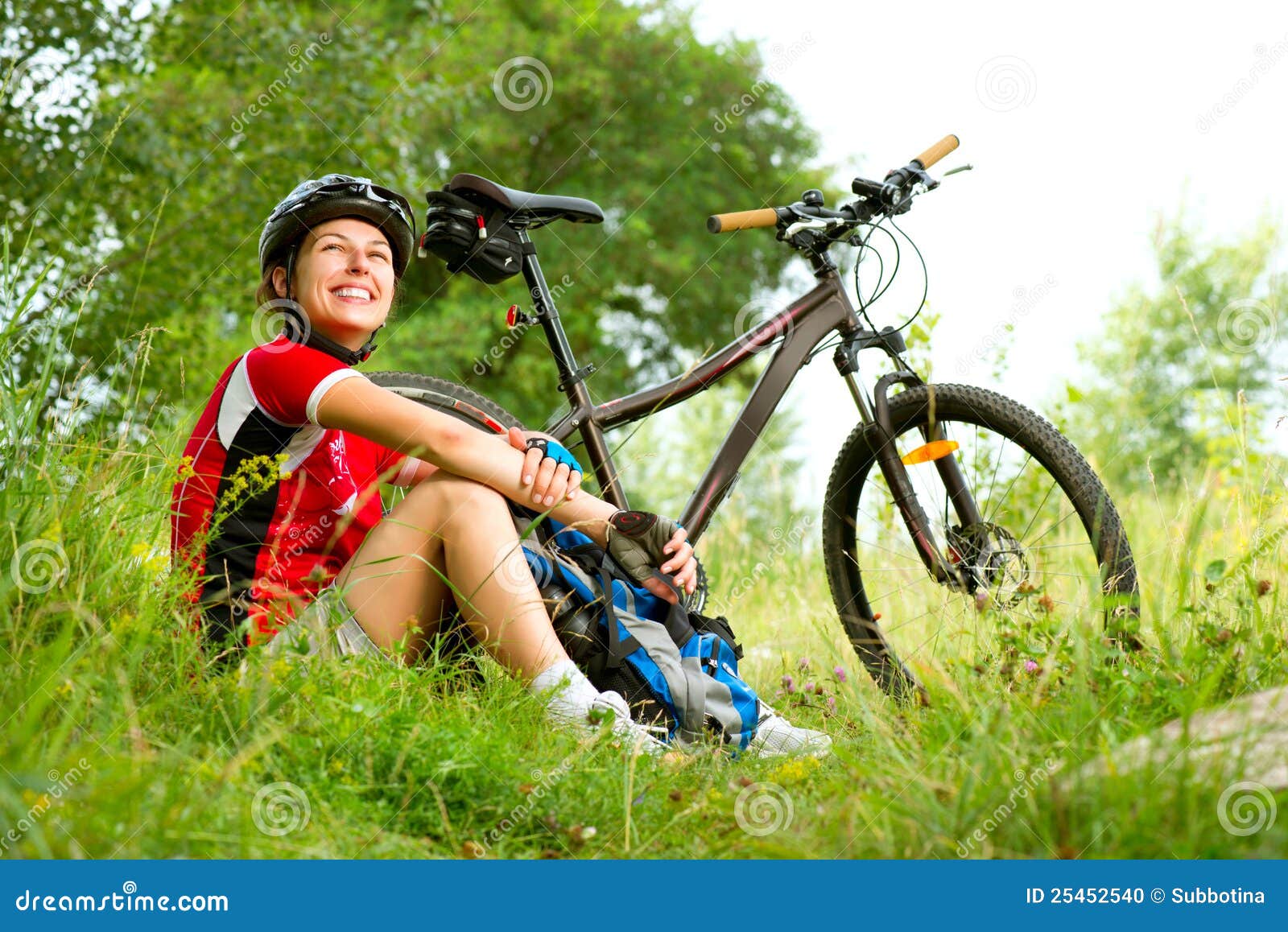 Young Woman riding bicycle stock photo. Image of cyclist 25452540