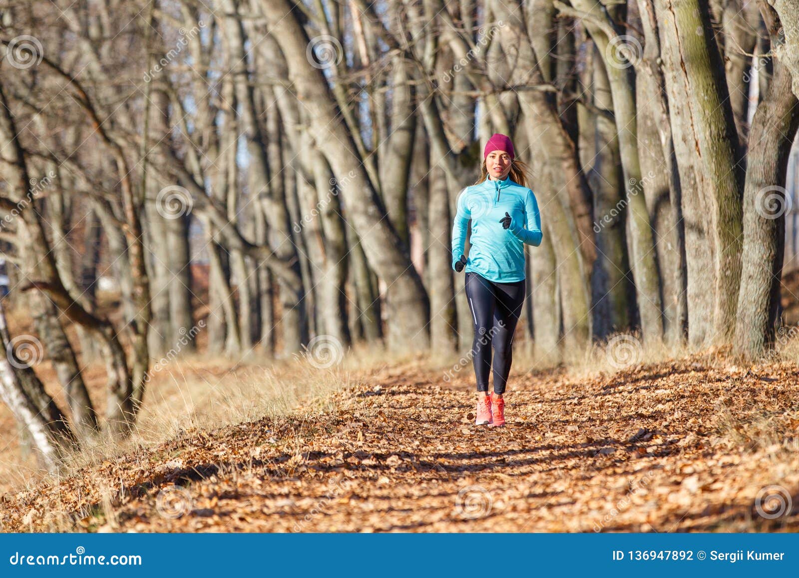 Young Woman Running in Autumn Park at Sunny Day Stock Photo - Image of ...