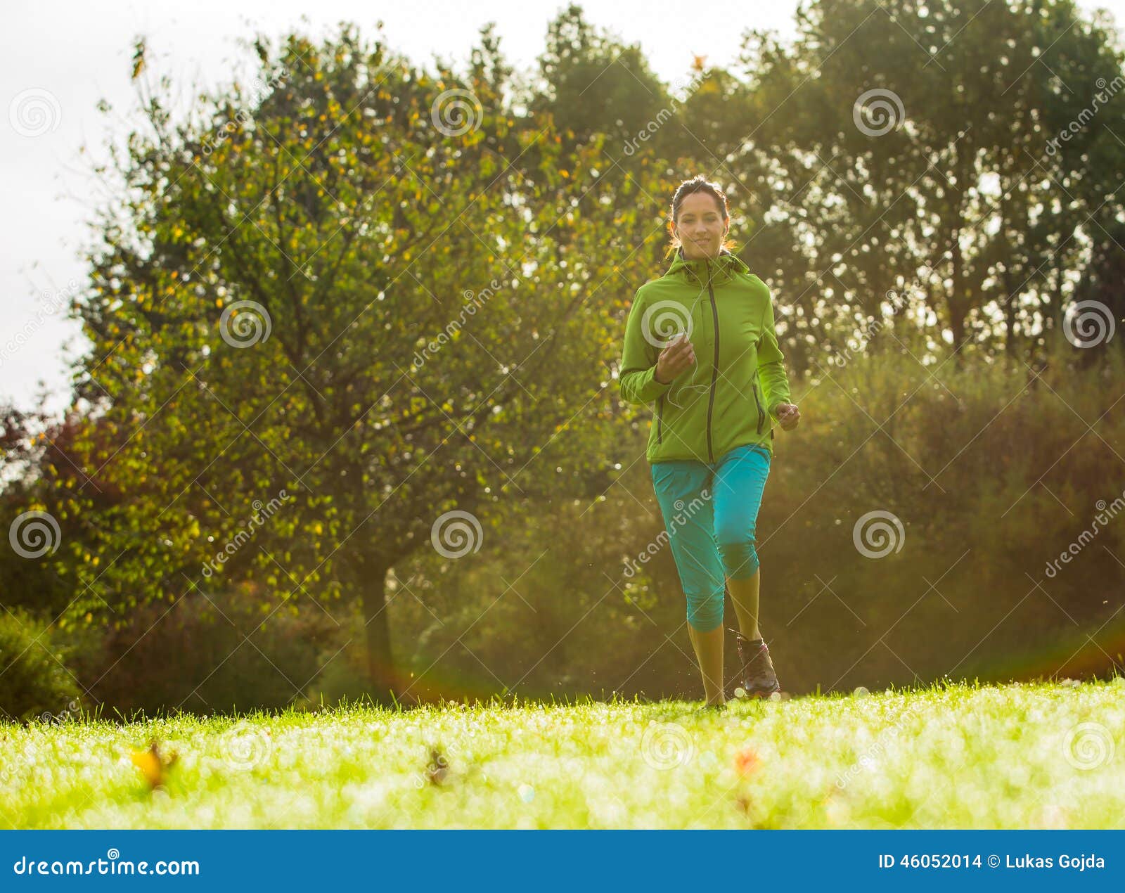 Young Woman Running and Listening To Music. Stock Photo - Image of ...
