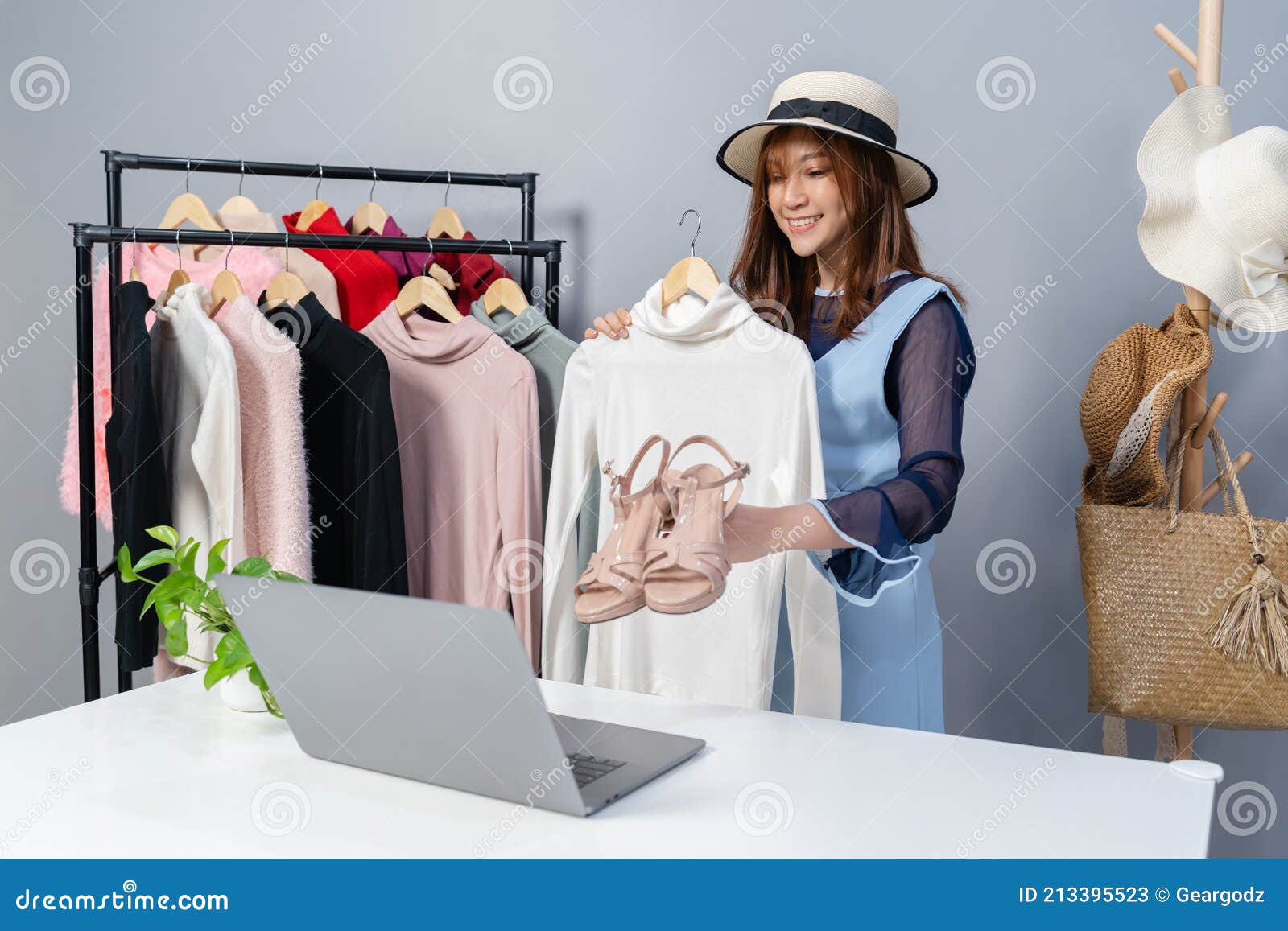 Woman Selling Clothes and Accessories Online by Laptop Computer Live Streaming, Business Online E-commerce at Home Stock Image