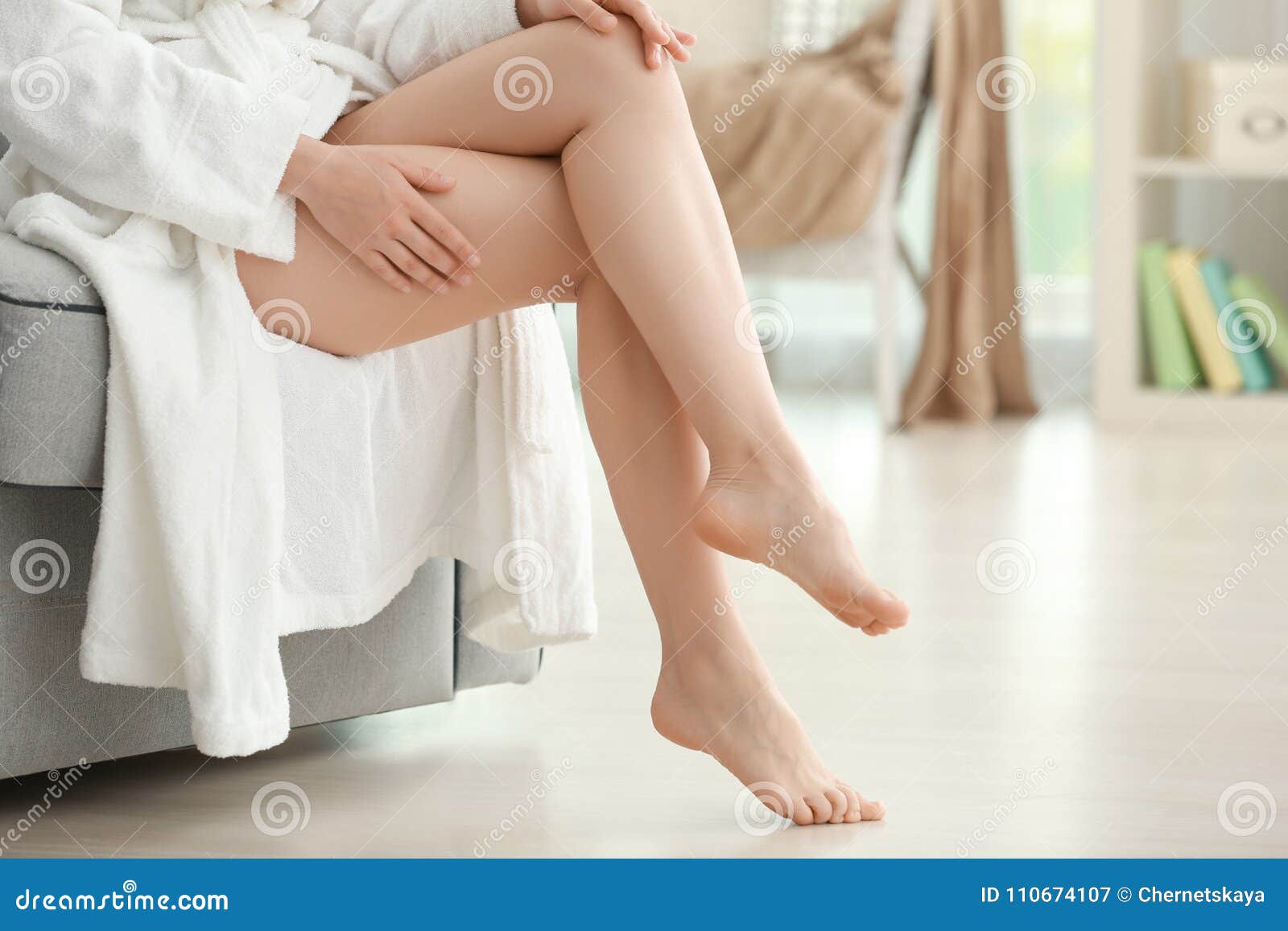 Young woman shaving legs stock image. Image of girl - 110674107