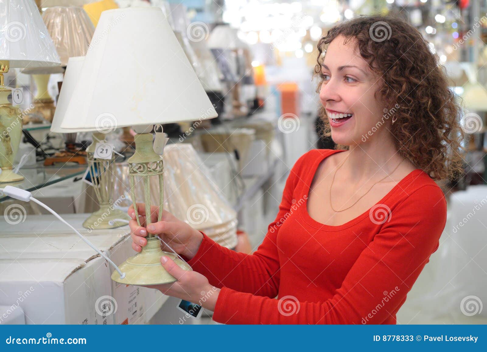 young woman in shop of house technics