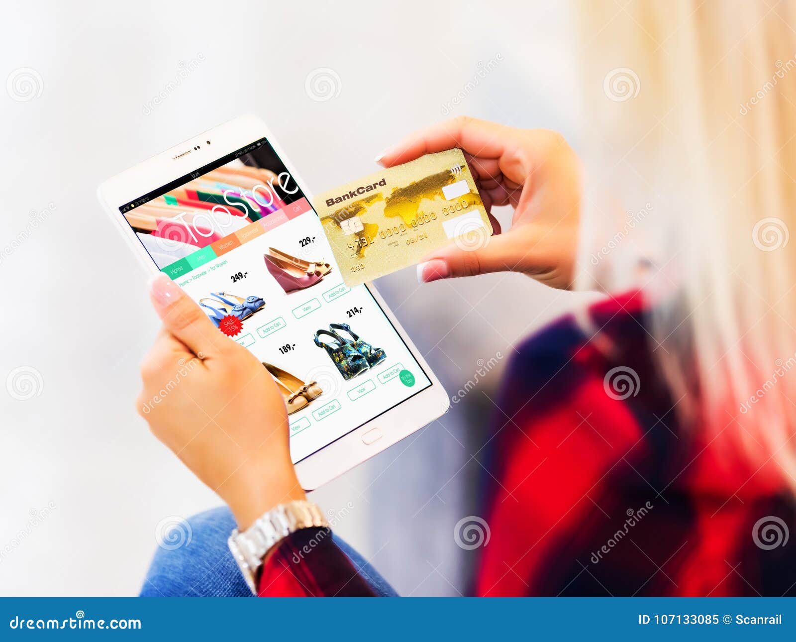 young woman shopping online with tablet computer and credit card