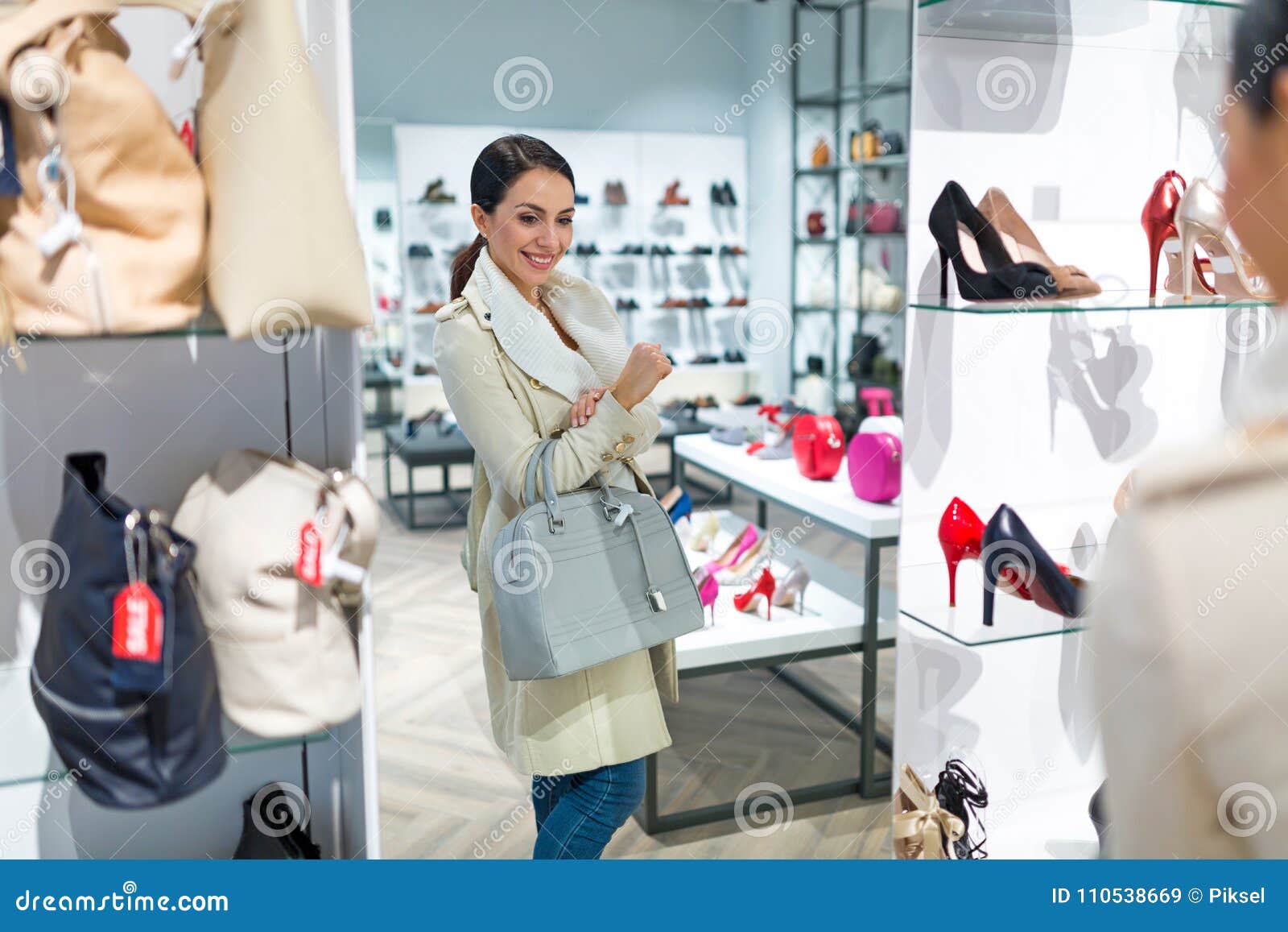 Woman shopping for shoes stock image. Image of choice - 110538669