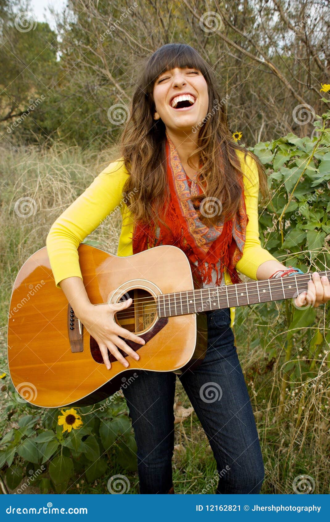 Young Woman Singing and Playing Guitar Stock Image Image of yellow