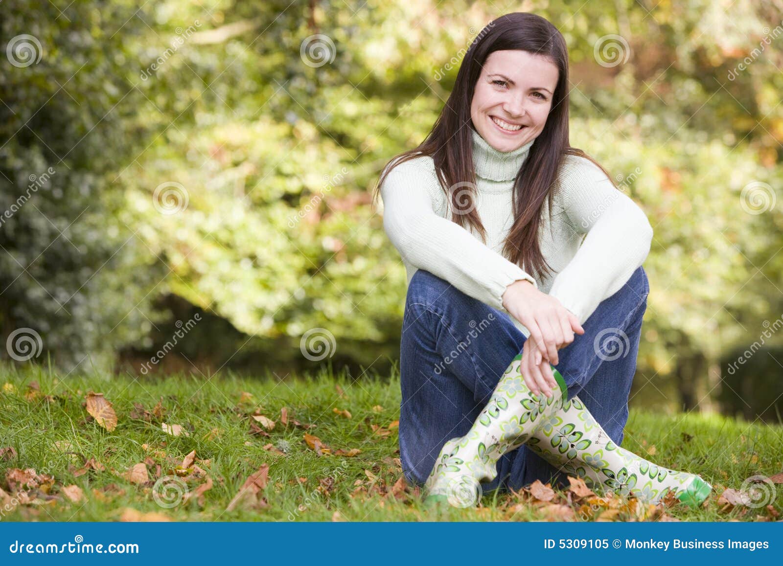 Young Woman Sitting Amongst Trees Stock Image - Image of resting ...