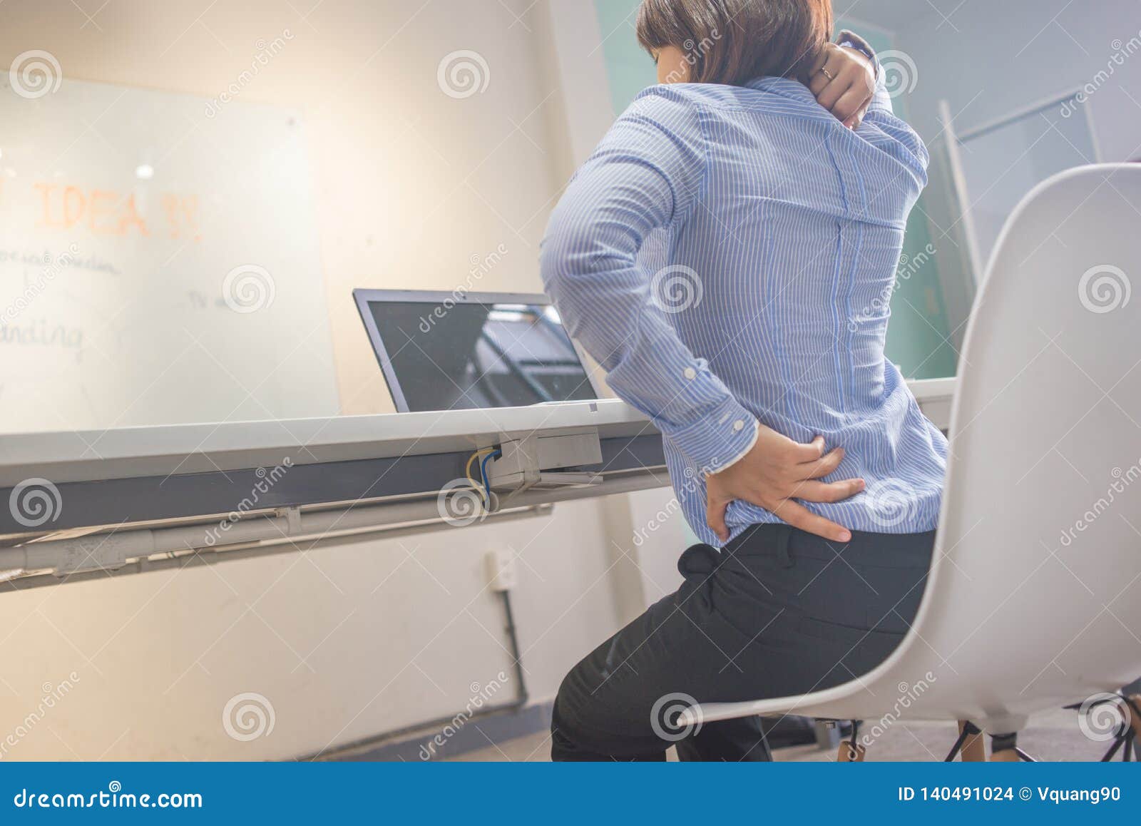Young Woman Sitting With Backache In Office Stock Photo Image Of