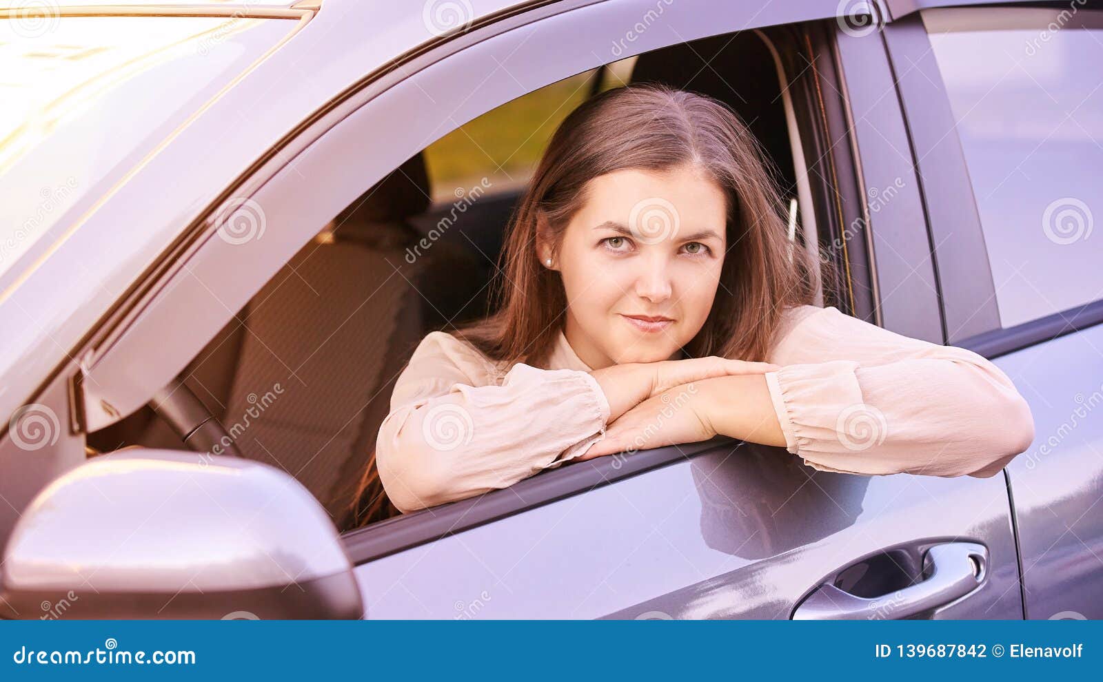Young Woman Sitting In Car Ride Instruction Automobile Loan Stock