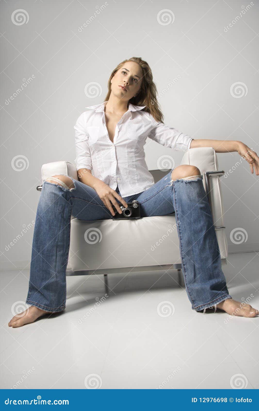 Young Woman Sitting on Chair Stock Photo Image of indoors, blond