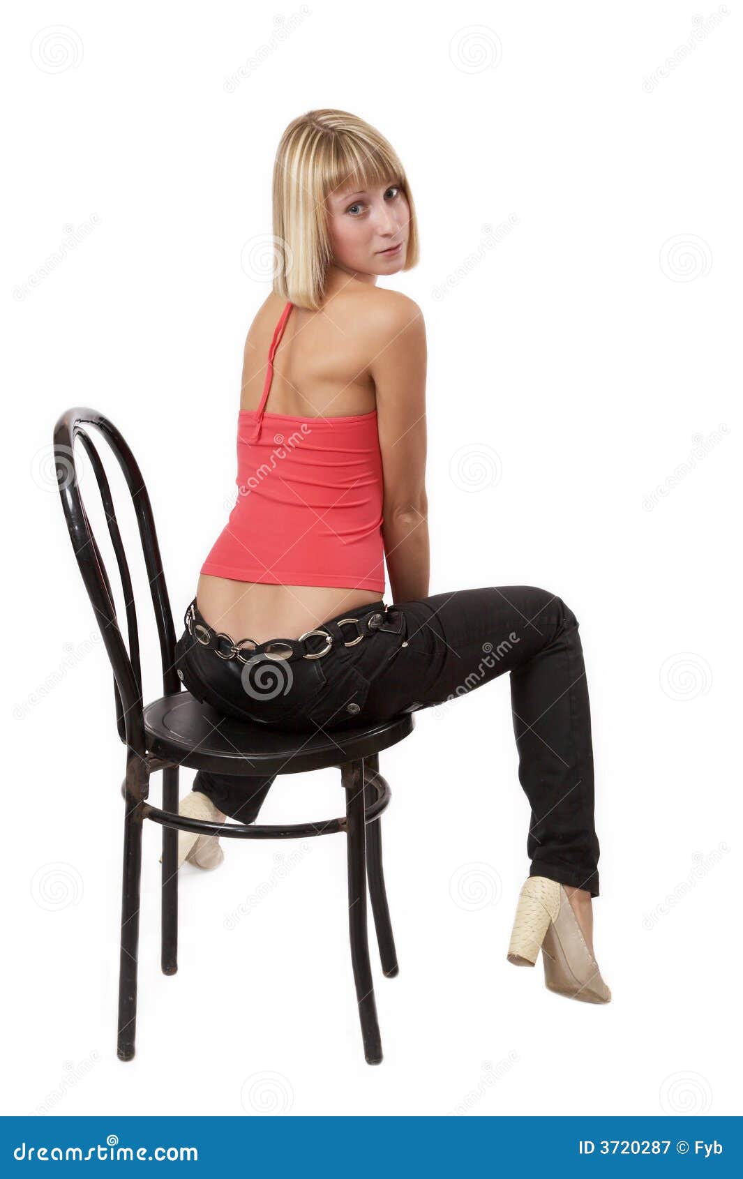 Young Woman Sitting On A Chair Royalty Free Stock Photography - Image