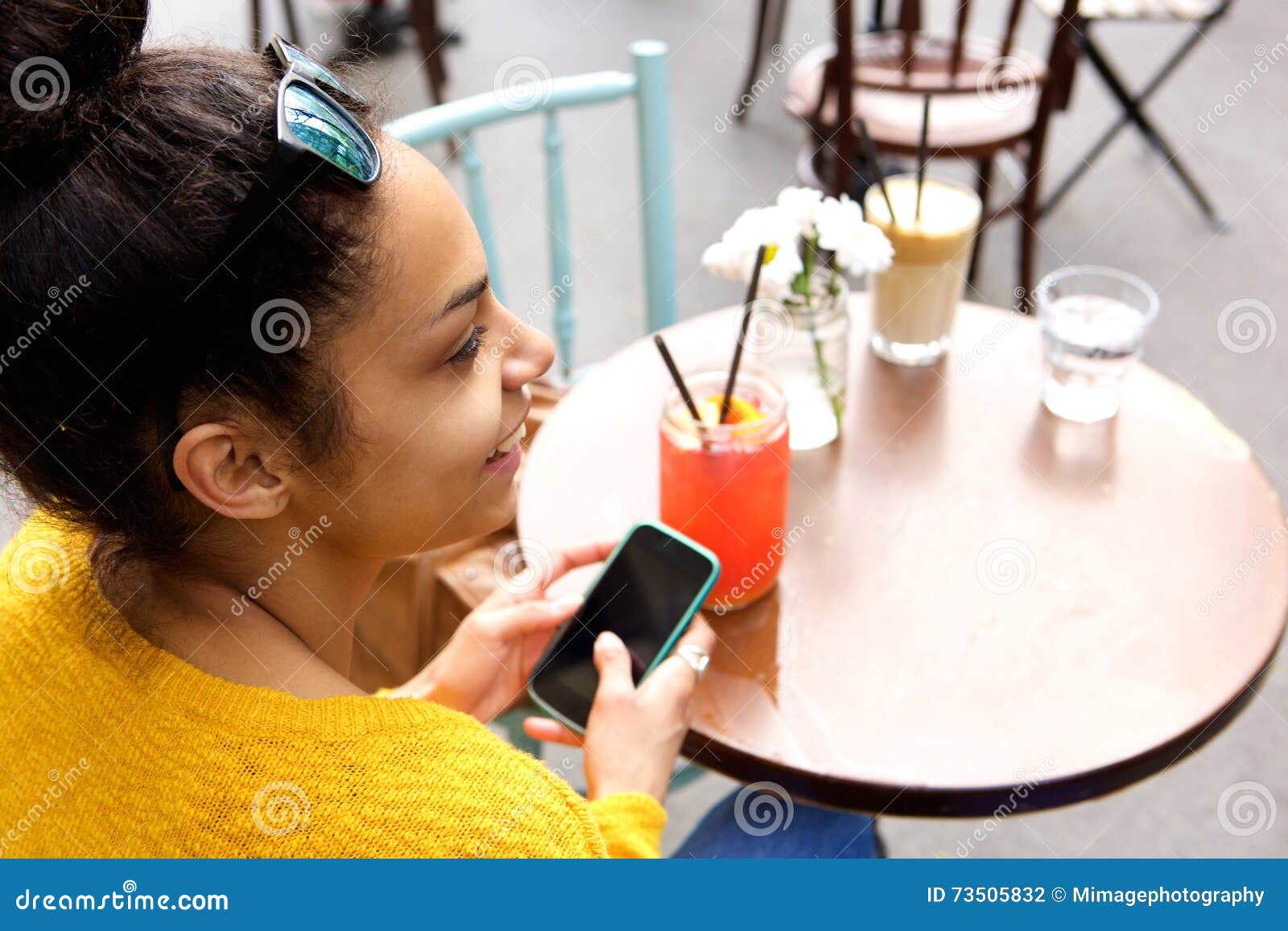 young woman sitting at coffeeshop