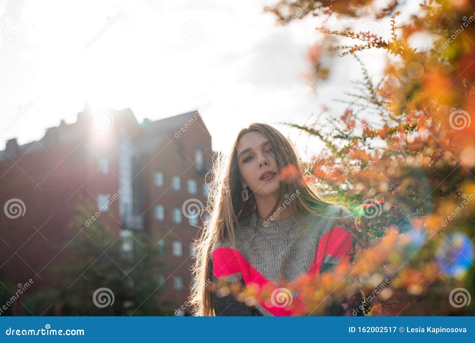 Young Woman Sitting in Front of Window Stock Image - Image of caucasian ...