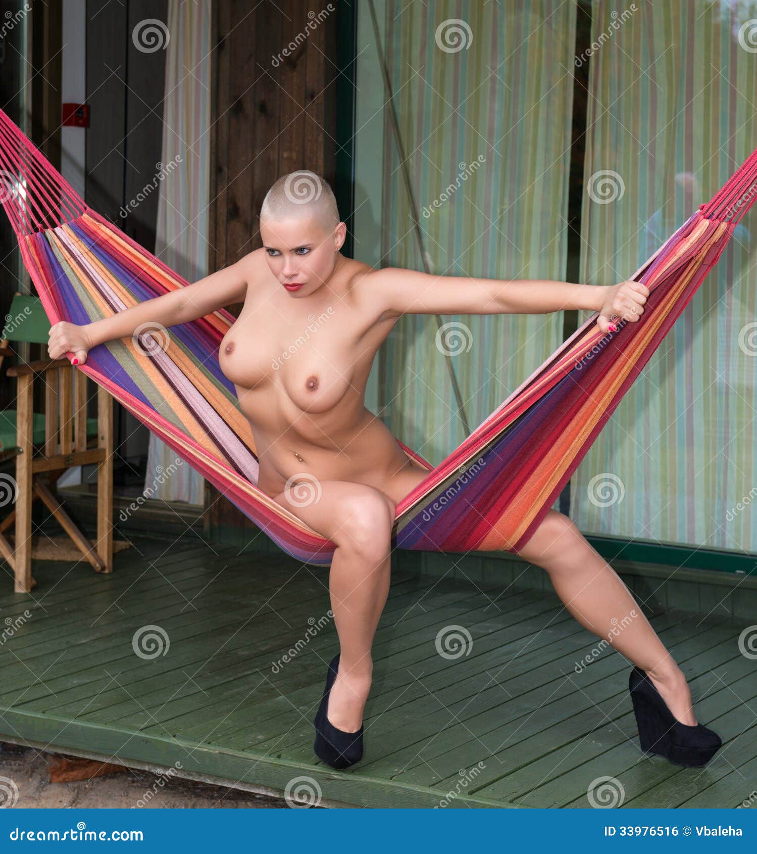 Young Woman Sitting on Hammock Stock Photo - Image of hotel, seductive:  33976516