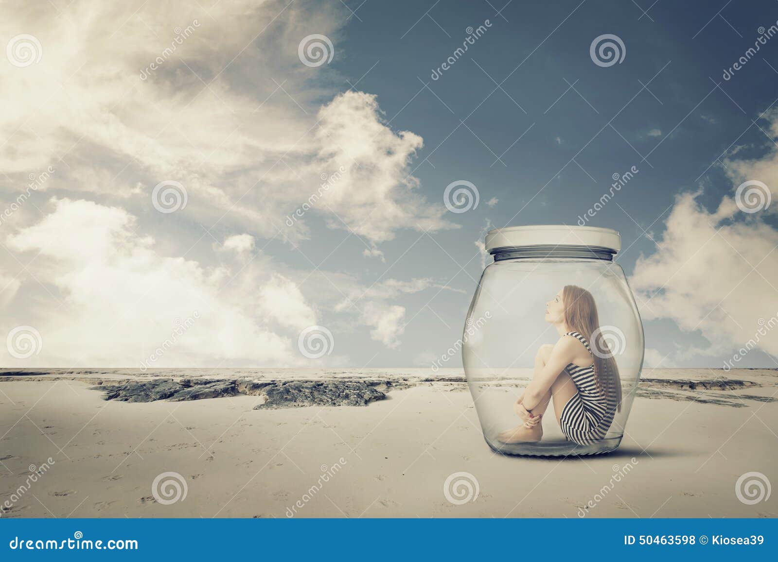 young woman sitting in a jar in the desert. loneliness outlier concept