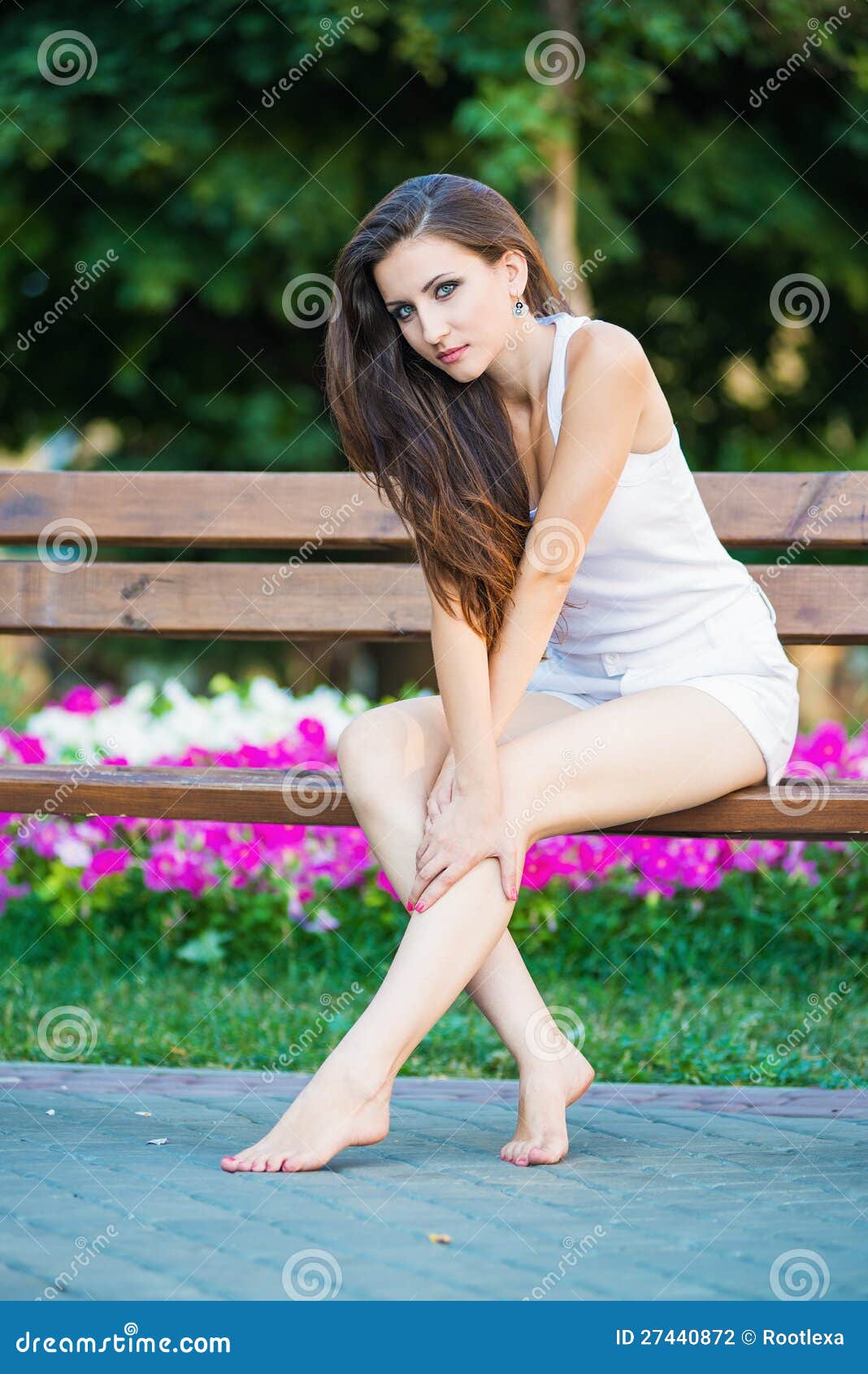 https://thumbs.dreamstime.com/z/young-woman-sitting-park-27440872.jpg