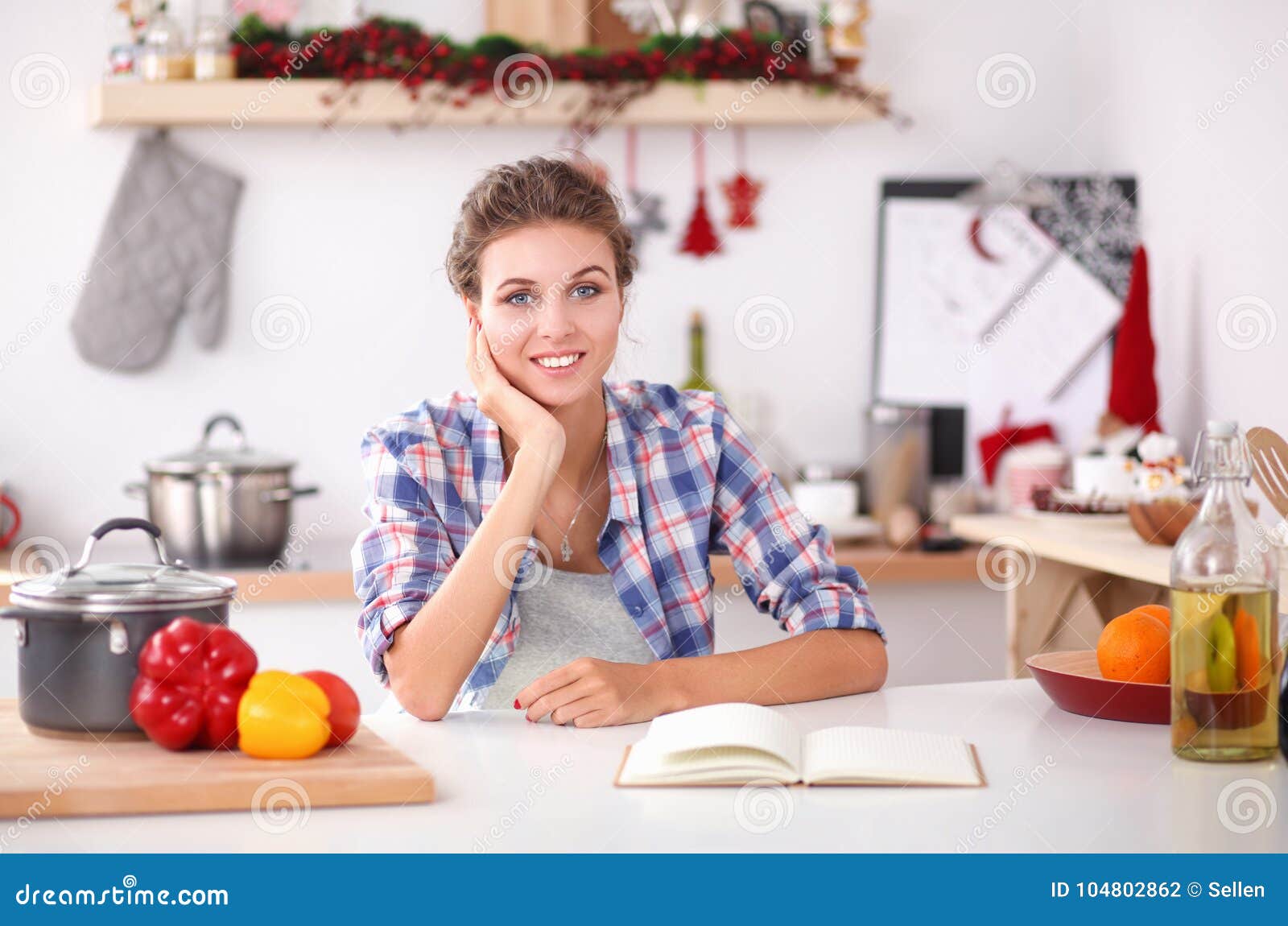 Young Woman Sitting A Table In The Kitchen Stock Photo Image Of