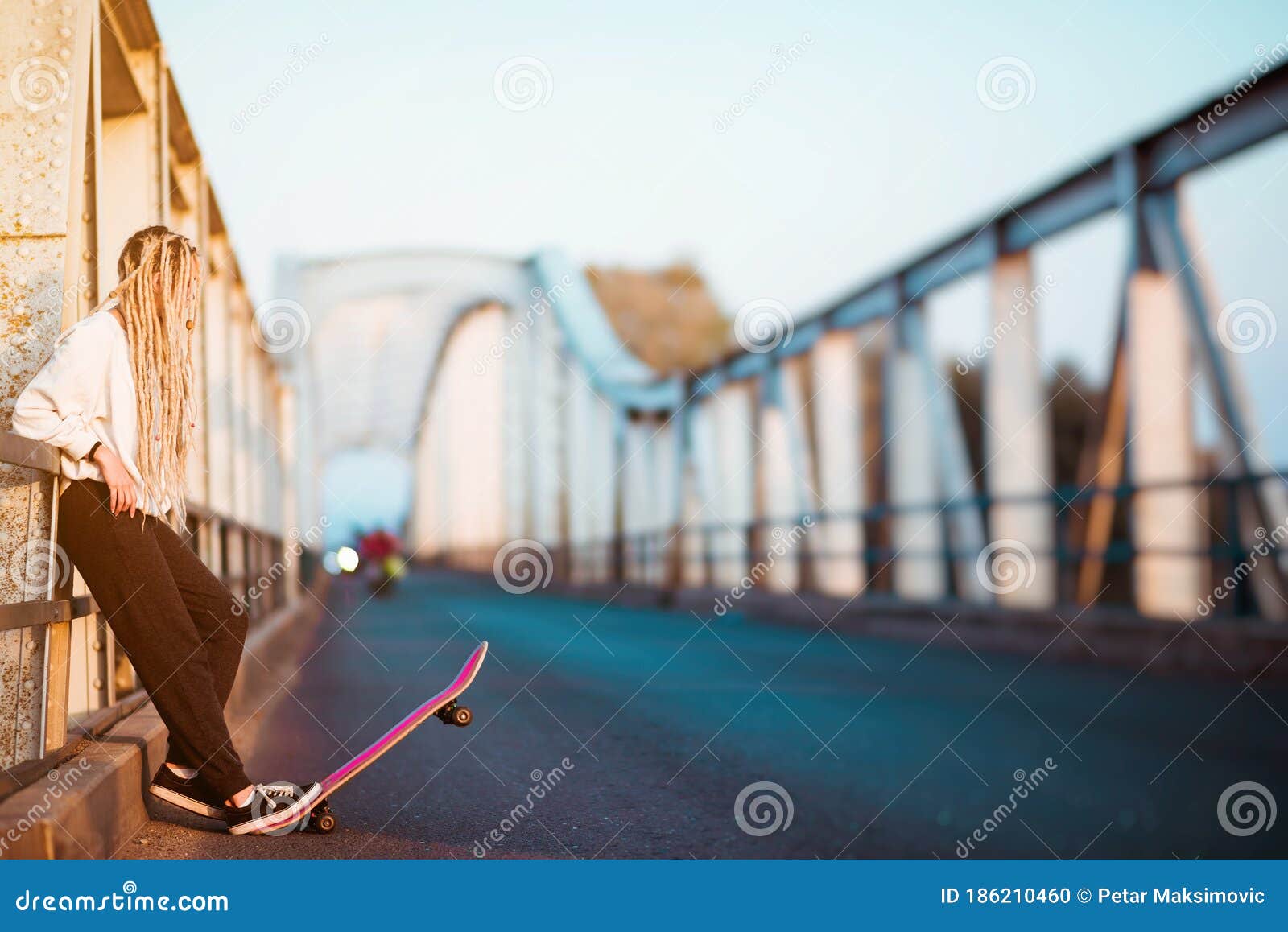 Young Woman with Skateboard on Bridge Stock Photo Image of bridge