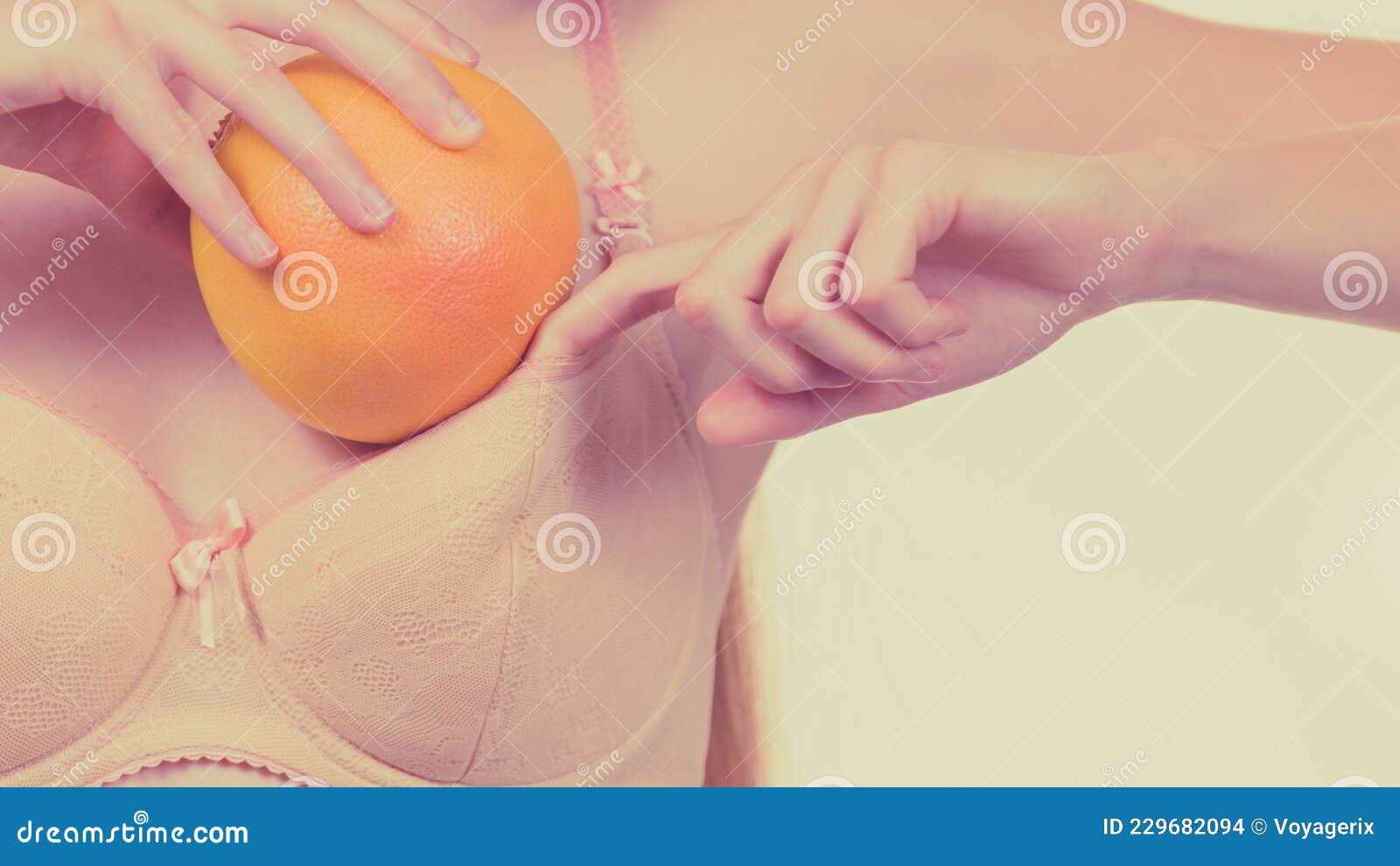 Woman Small Boobs Puts Big Fruit in Her Bra Stock Photo - Image of