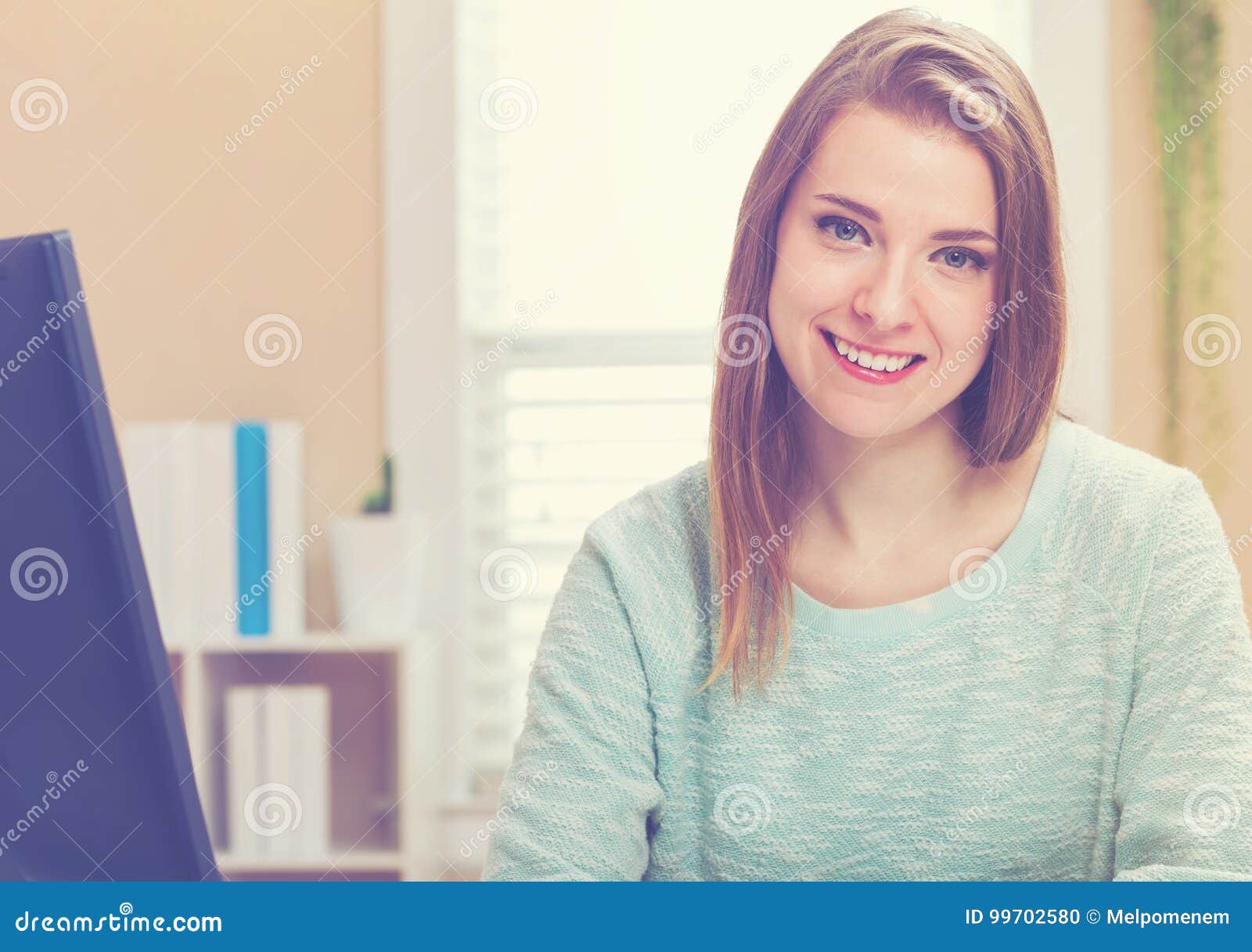 Young Woman Smiling in Her Home Office Stock Photo - Image of modern ...