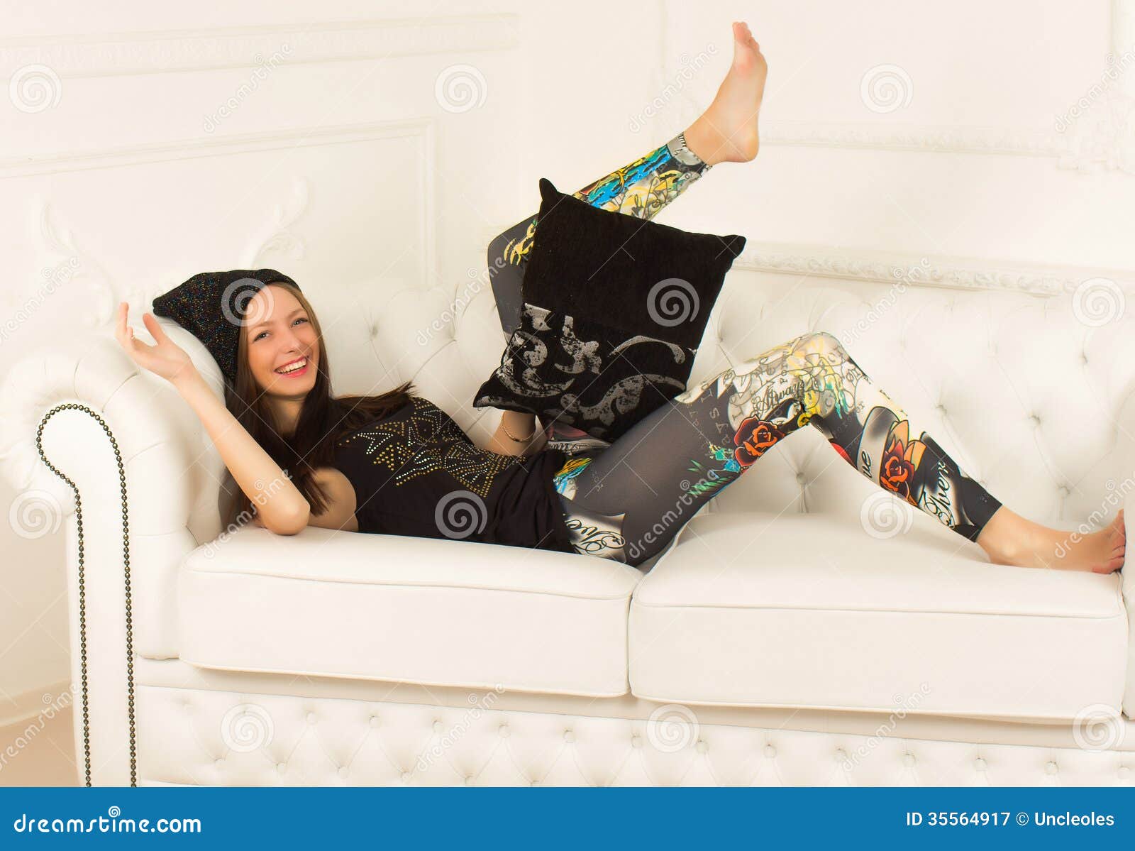 Young woman on a sofa stock image. Image of people, email 35564917