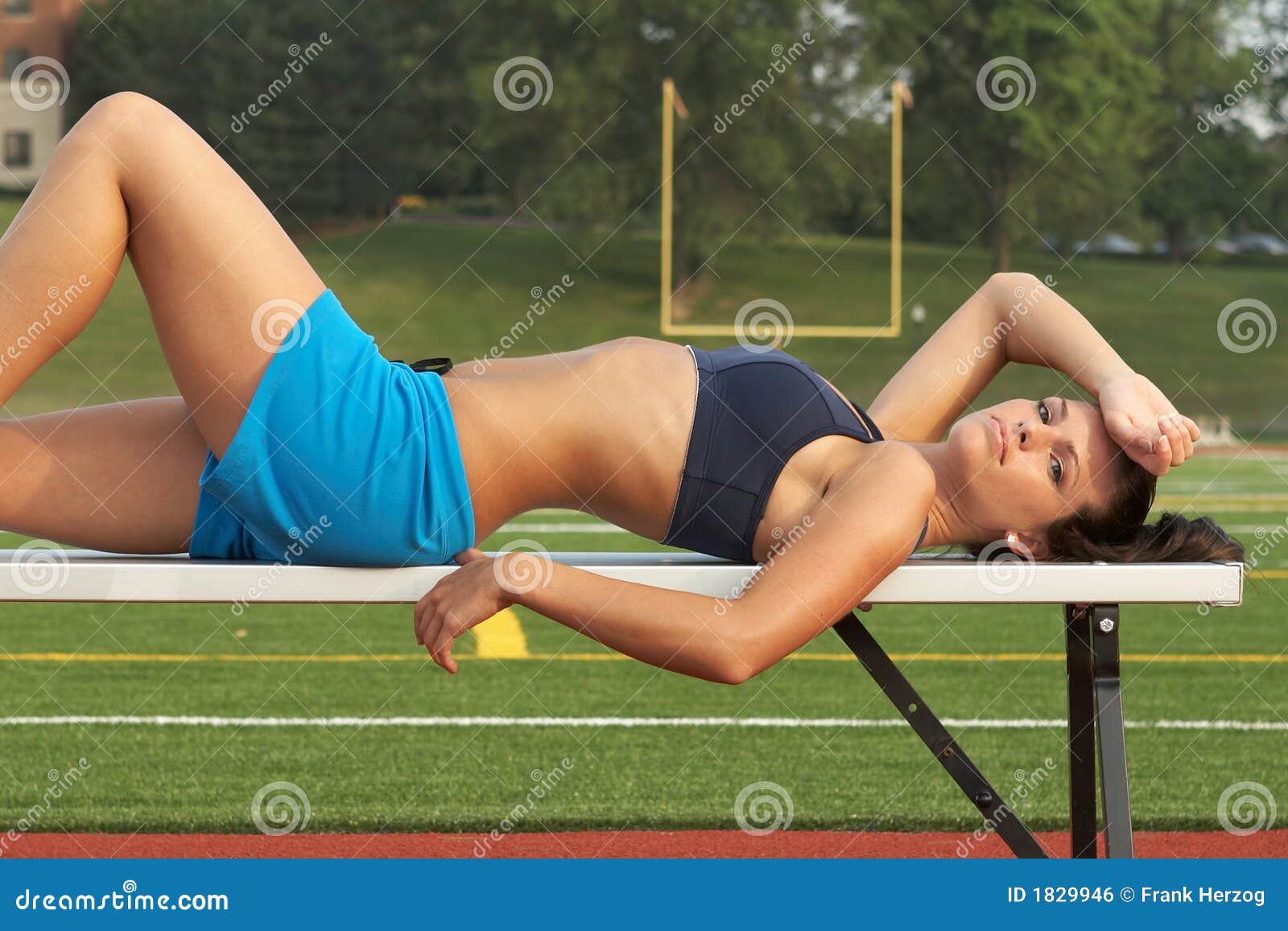 Young Woman in Sports Bra Laying on Bench Stock Photo - Image of winner,  healthy: 1829946