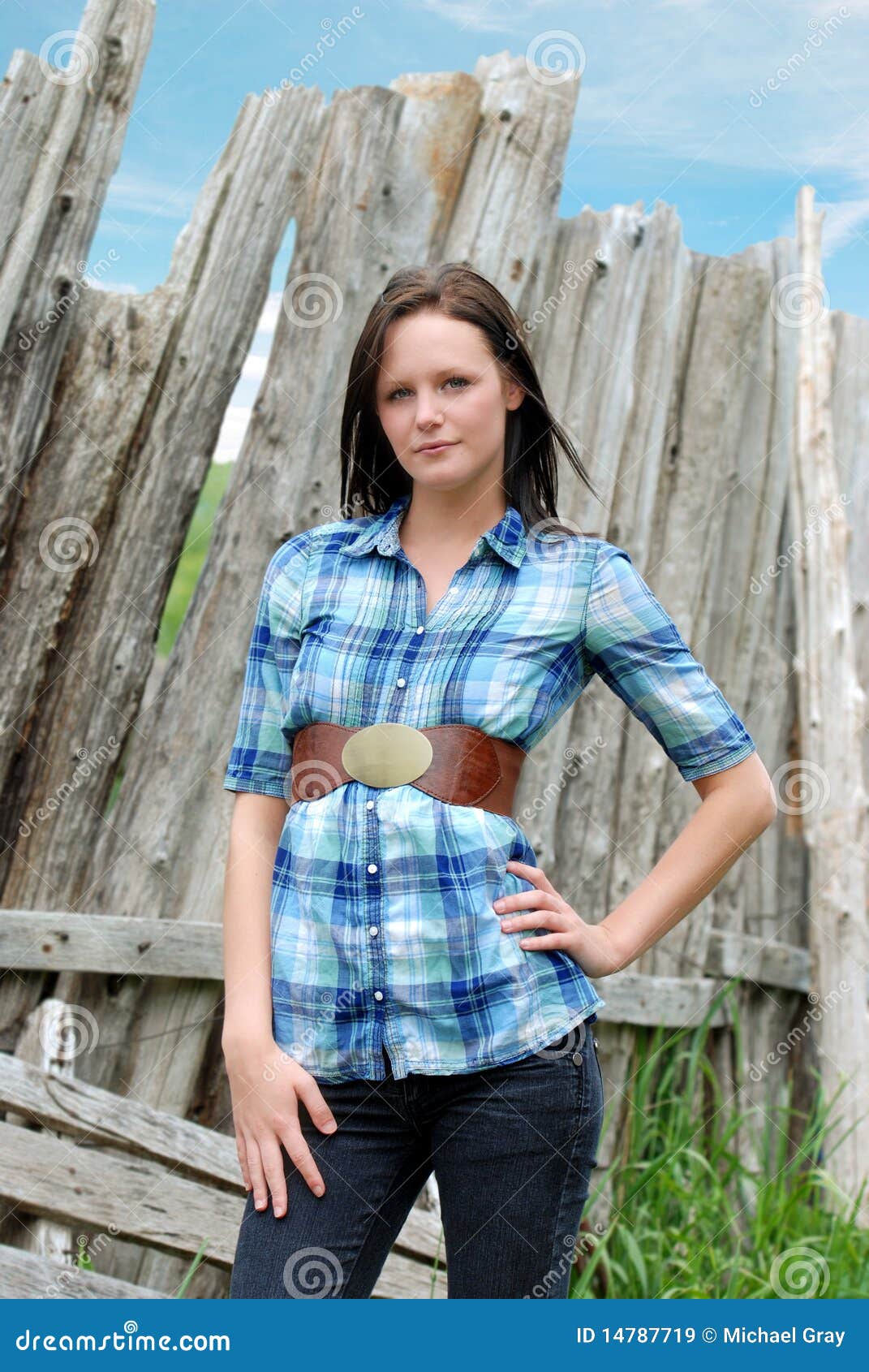 Young Woman Standing Near Old Wood Post Fence Stock Image 