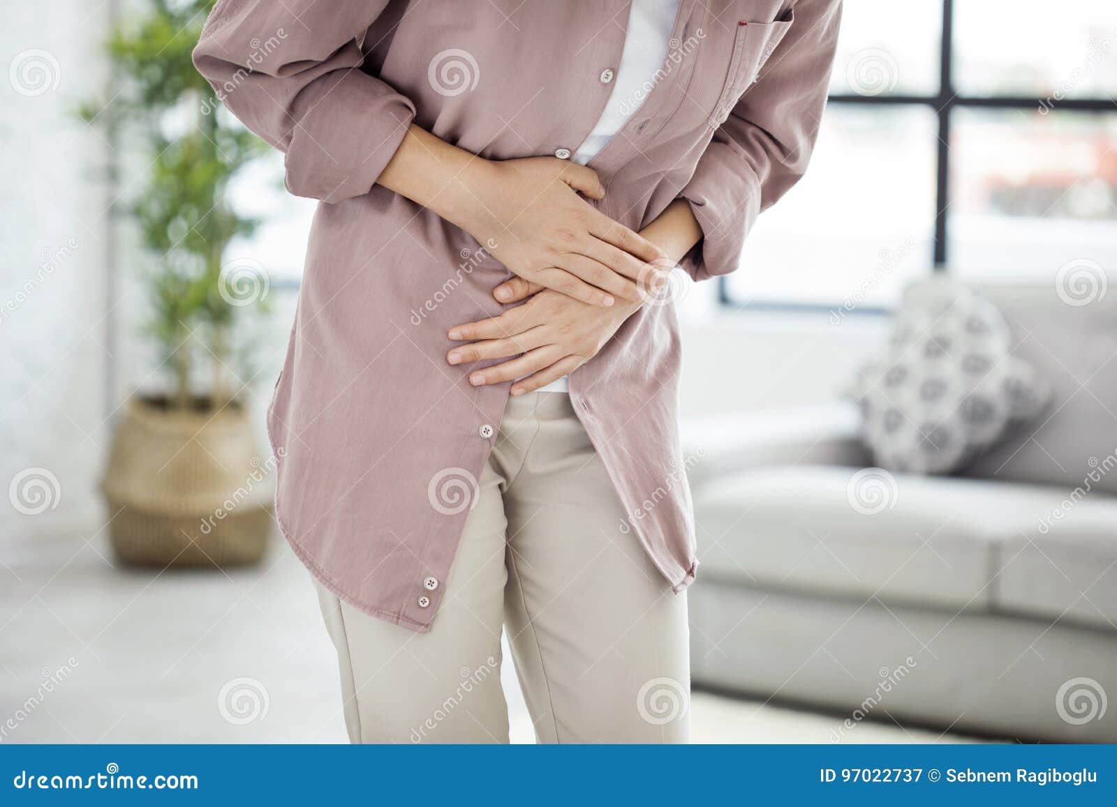 young woman with stomach pain