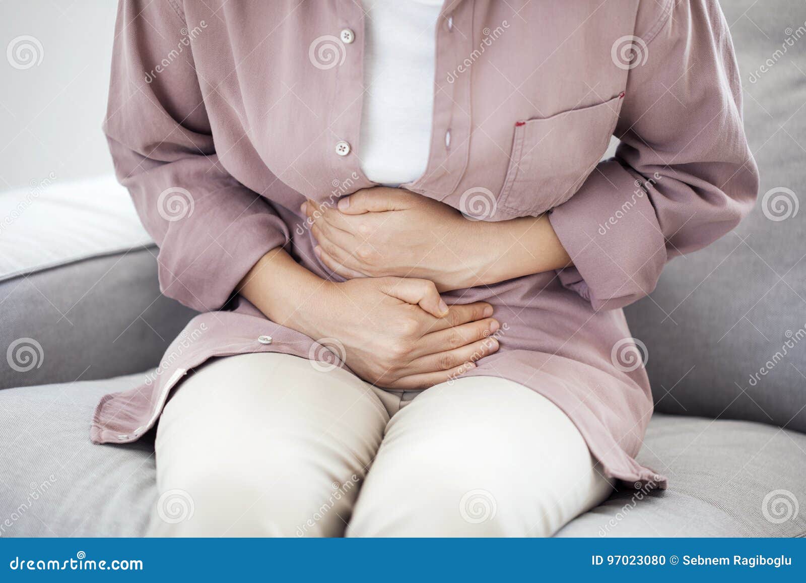 young woman with stomach pain