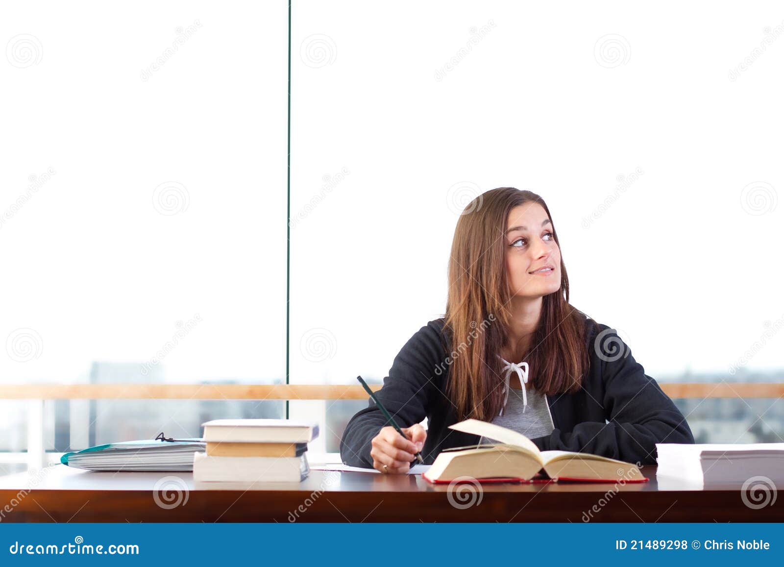 Young woman studying stock photo. Image of background - 21489298