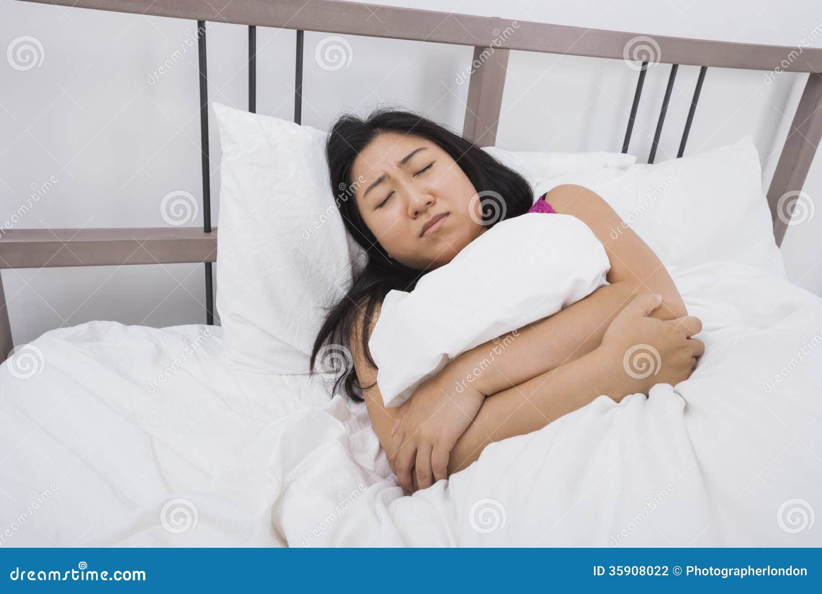 Young Woman Suffering from Stomach Ache Lying in Bed Stock Photo Image of japanese, asian