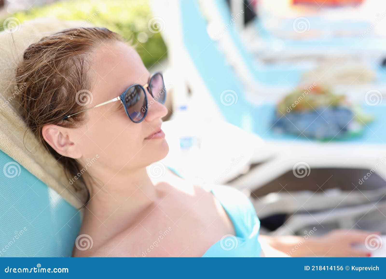 Young Woman in Sunglasses Lying on Sun Lounger Stock Photo - Image of ...