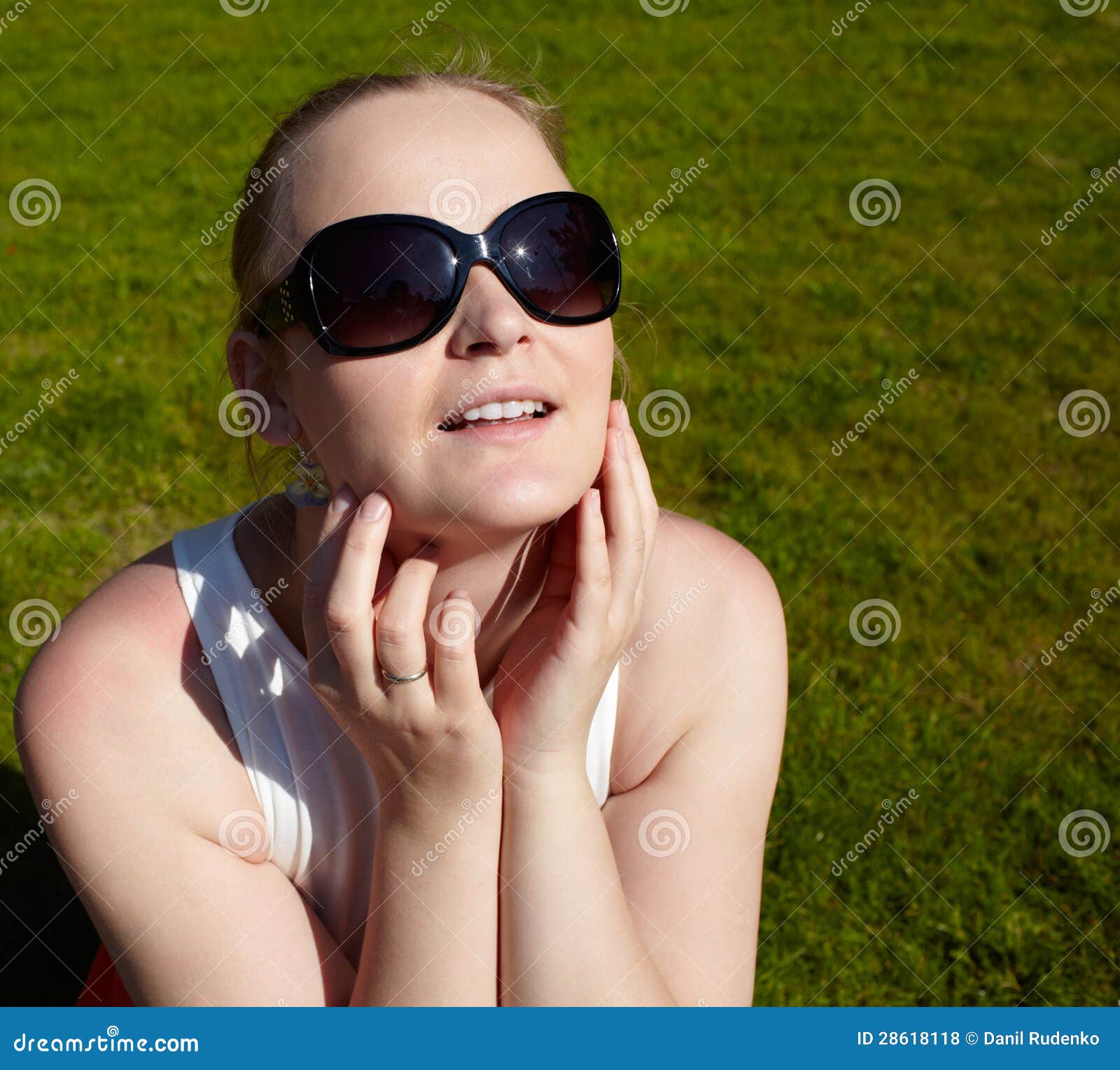 Young Woman in Sunglasses is Sunbathing. Stock Photo Image of relax