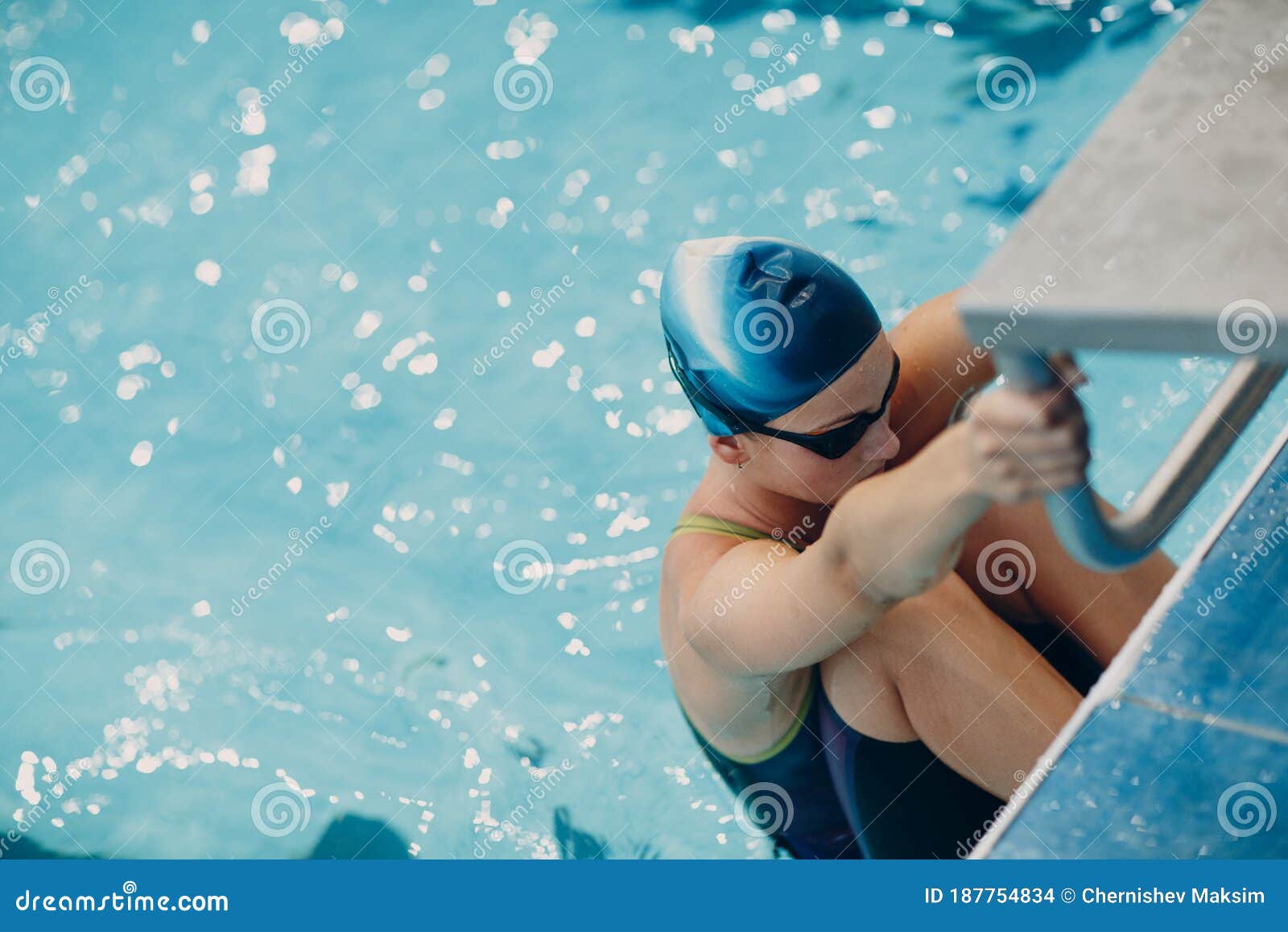 two girls fisting by pool