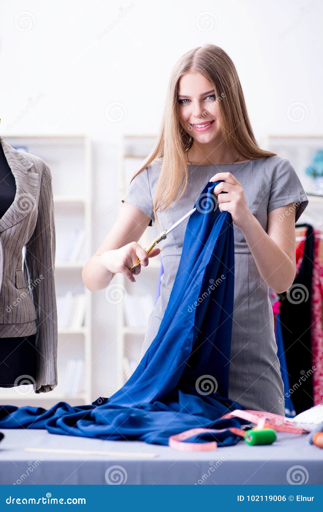 The Young Woman Tailor Working in Workshop on New Dress Stock Photo ...