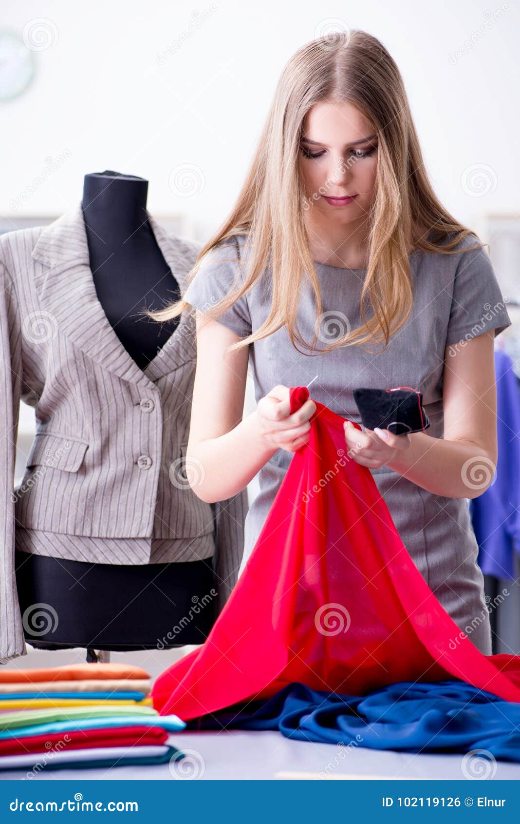 The Young Woman Tailor Working in Workshop on New Dress Stock Photo ...
