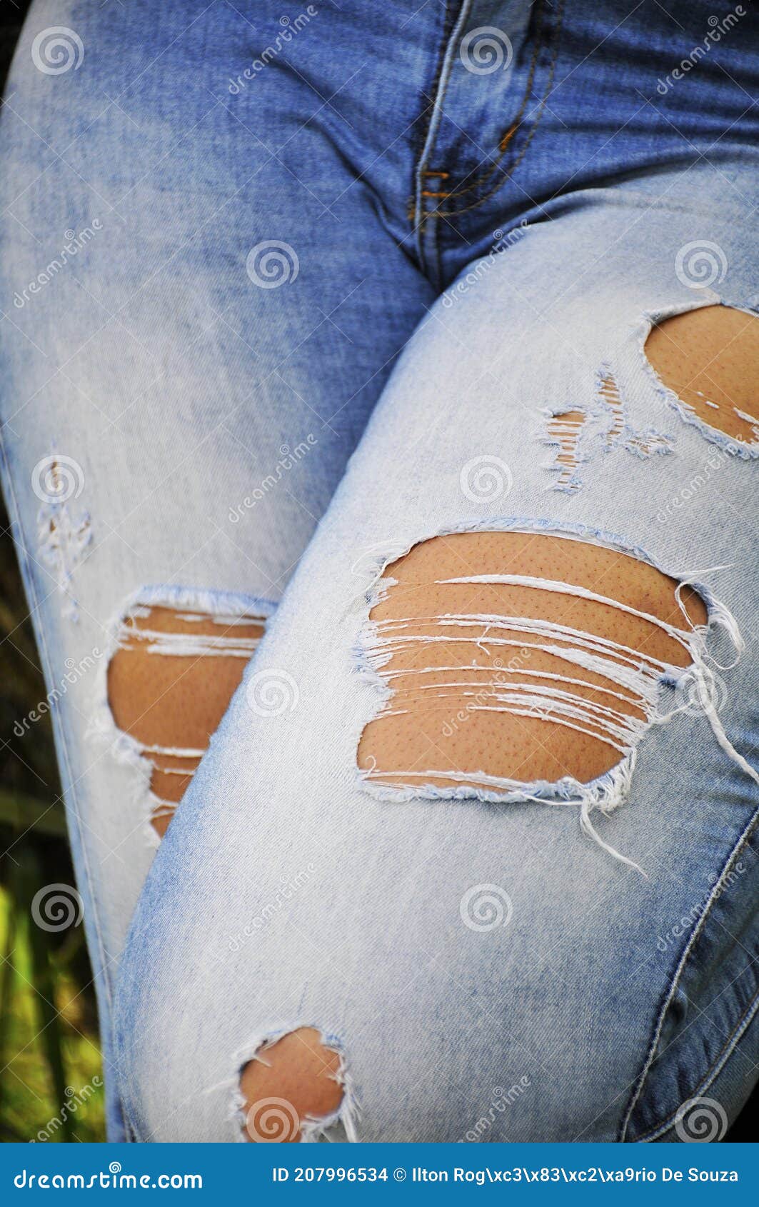 Ripped jeans stock photo. Image of ethnicity, fashion - 207996534