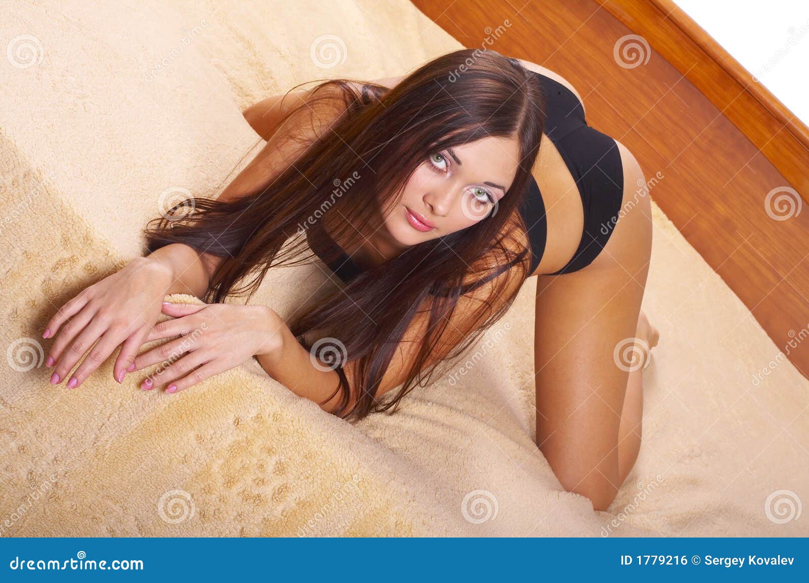 Young Woman Wearing Revealing Underwear Lounging In Bedroom Stock Photo,  Picture and Royalty Free Image. Image 62610429.