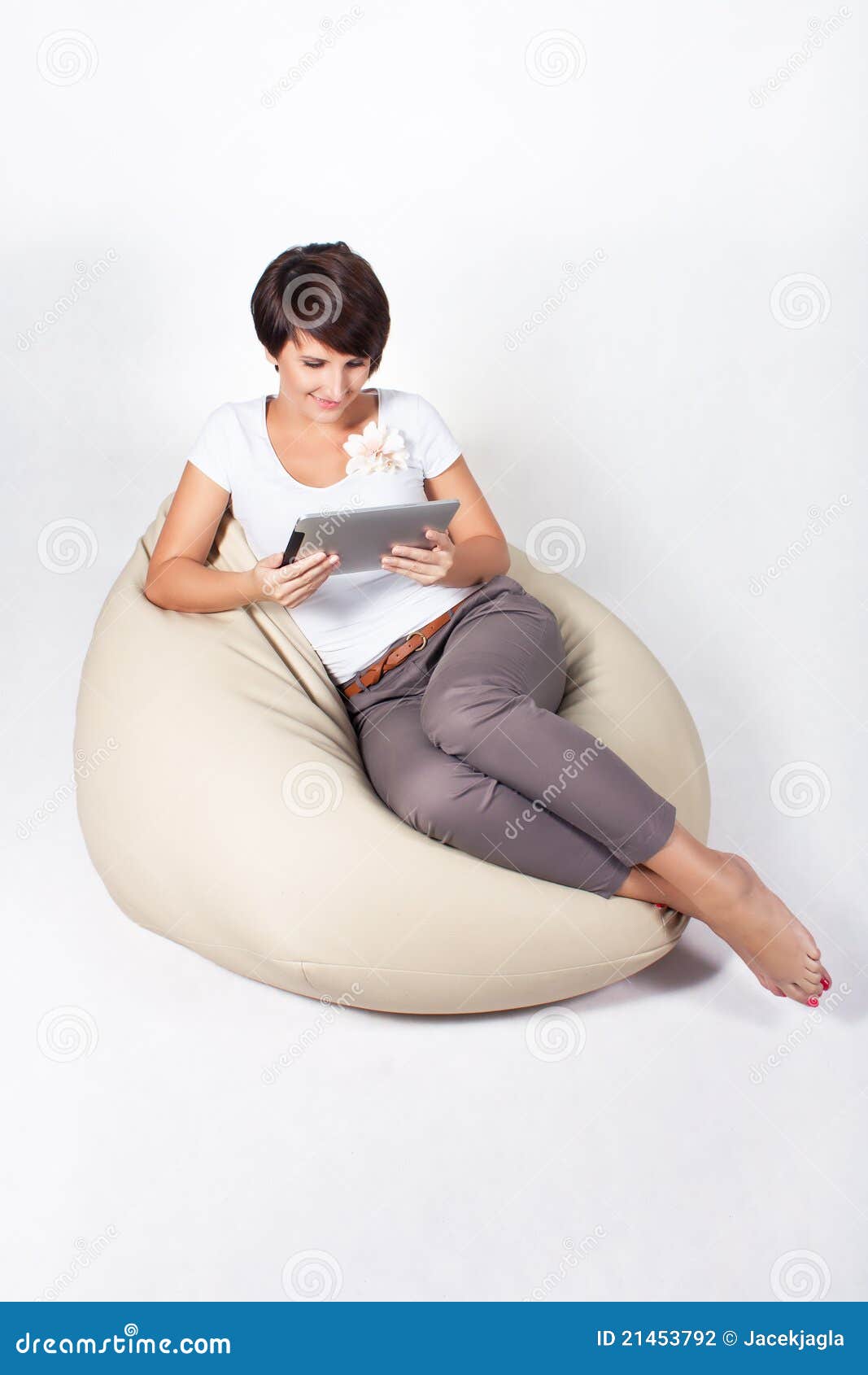 Young woman using iPad stock photo. Image of businesswoman - 21453792