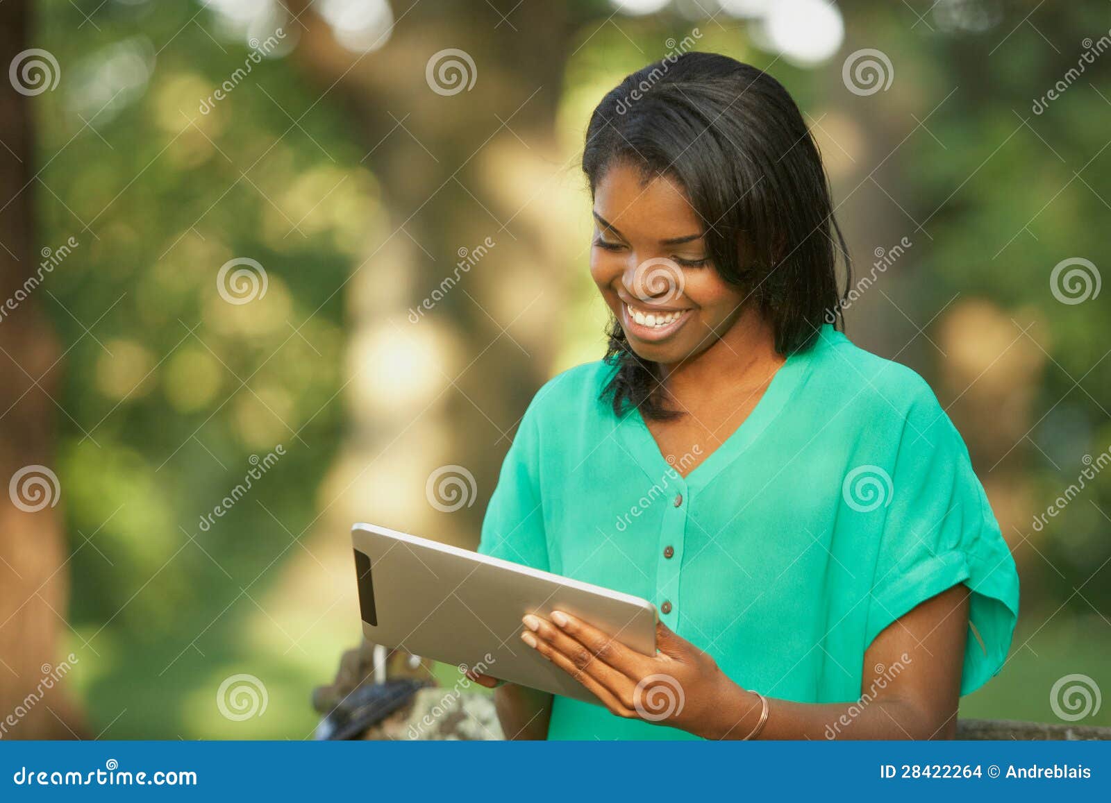 young woman using tablet computer