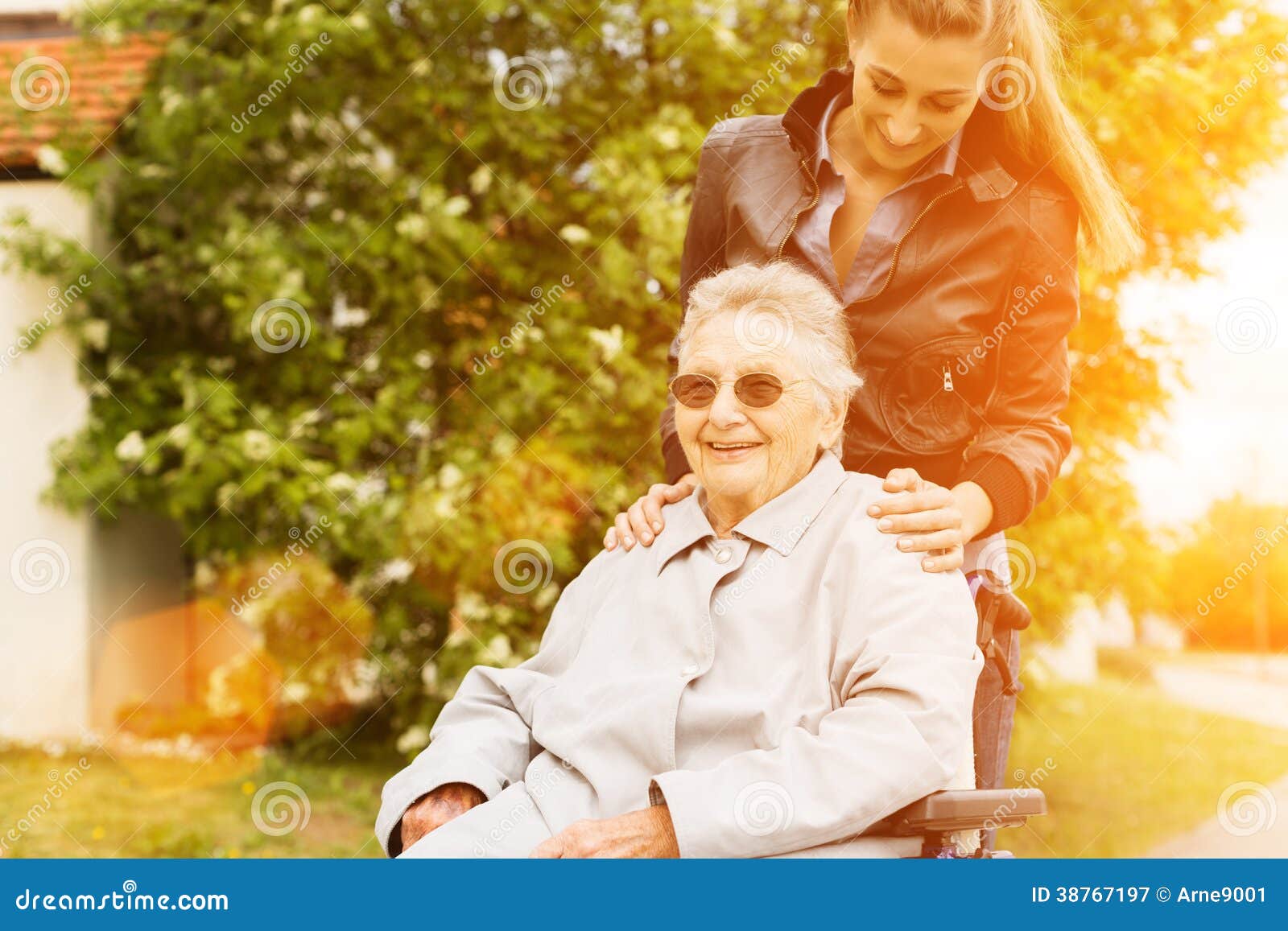young woman visiting grandmother in nursing home