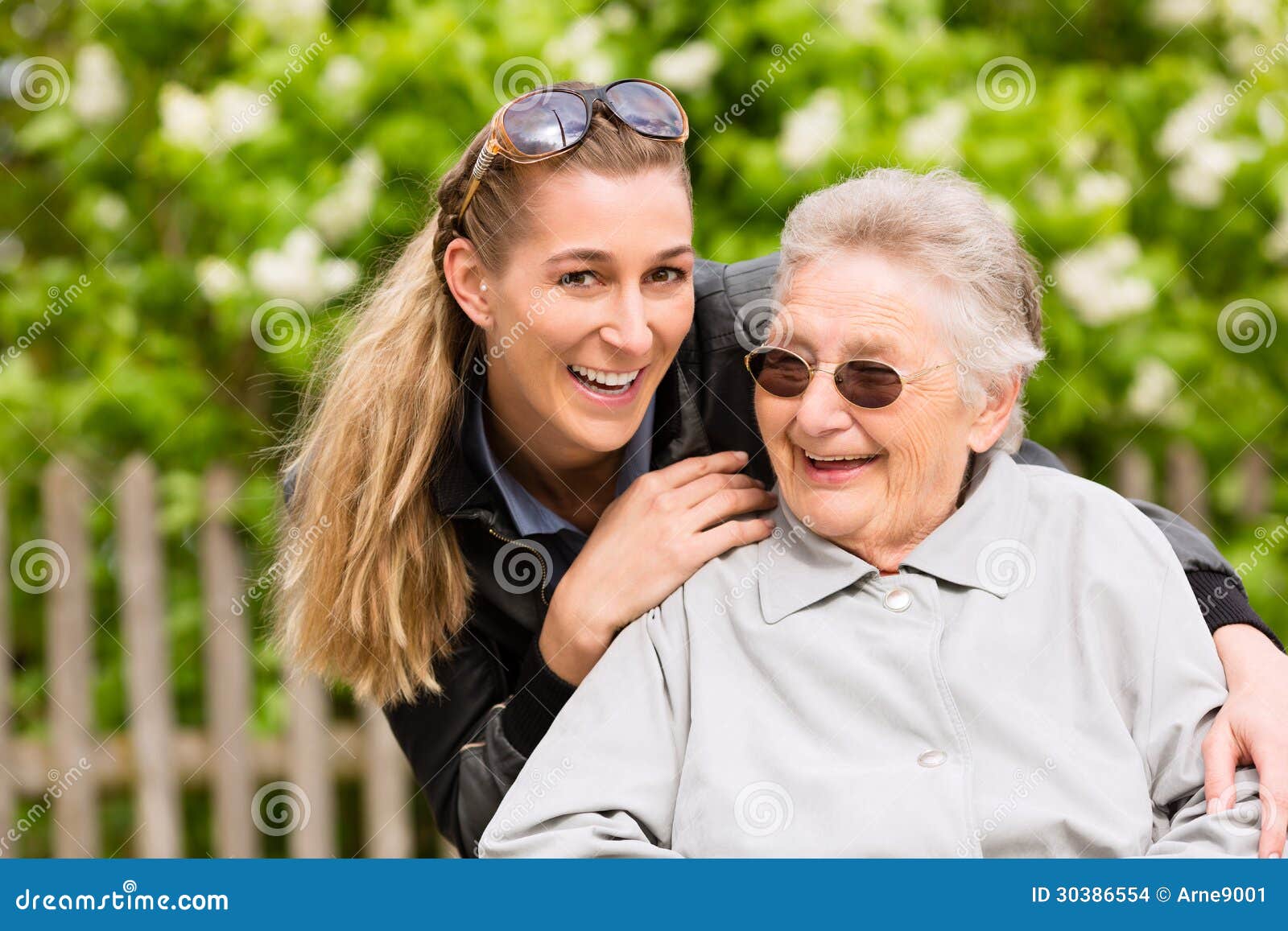 young woman is visiting her grandmother in nursing home