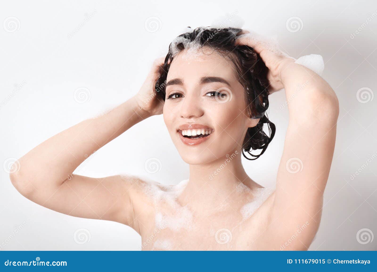 Young Emotional Woman Washing Hair While Taking Shower 