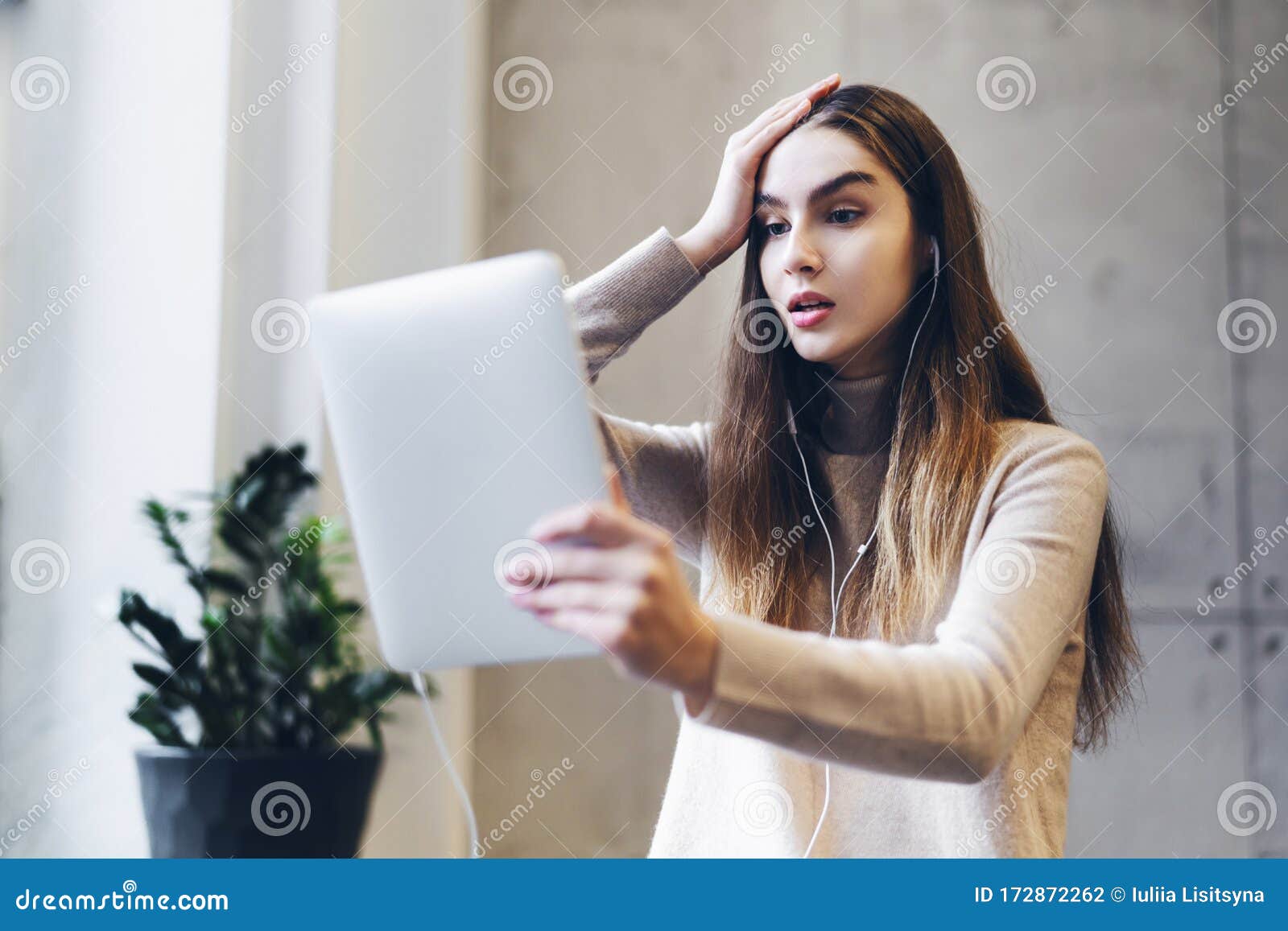 Even For The Internet It's Pretty Shocking Young Woman Watching Shocking Content Online on Internet. Emotional