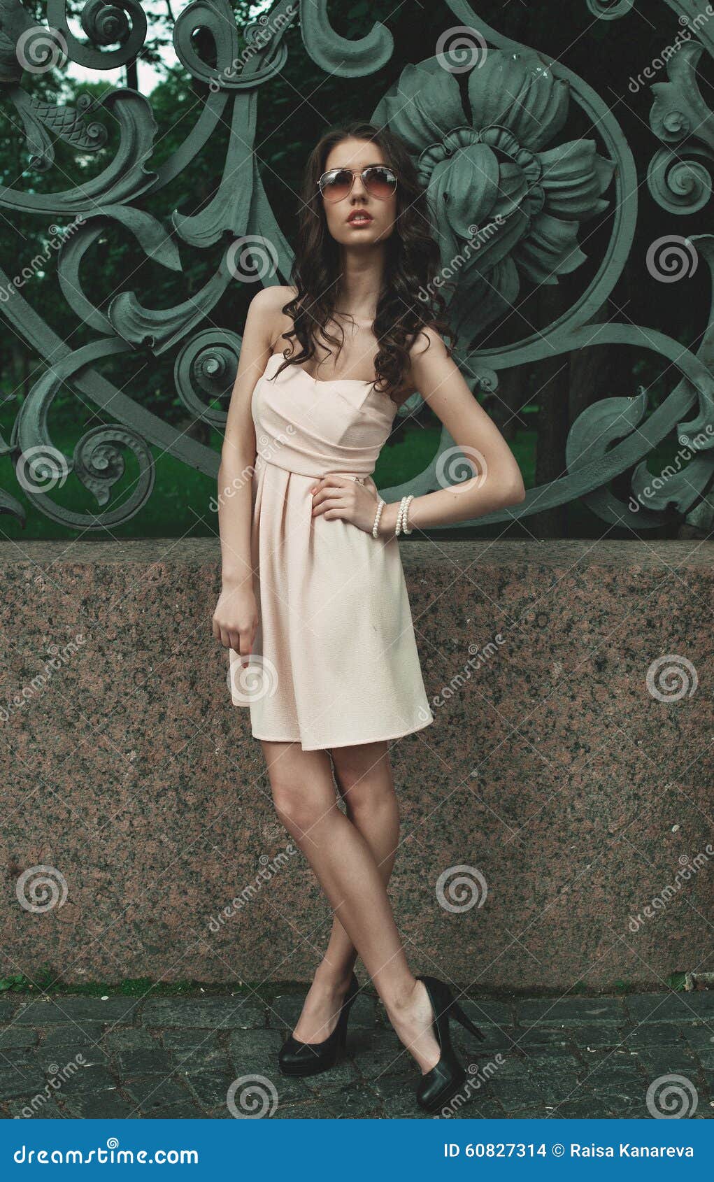 Young Woman Wearing Dress and Walking on the Street Stock Photo - Image ...