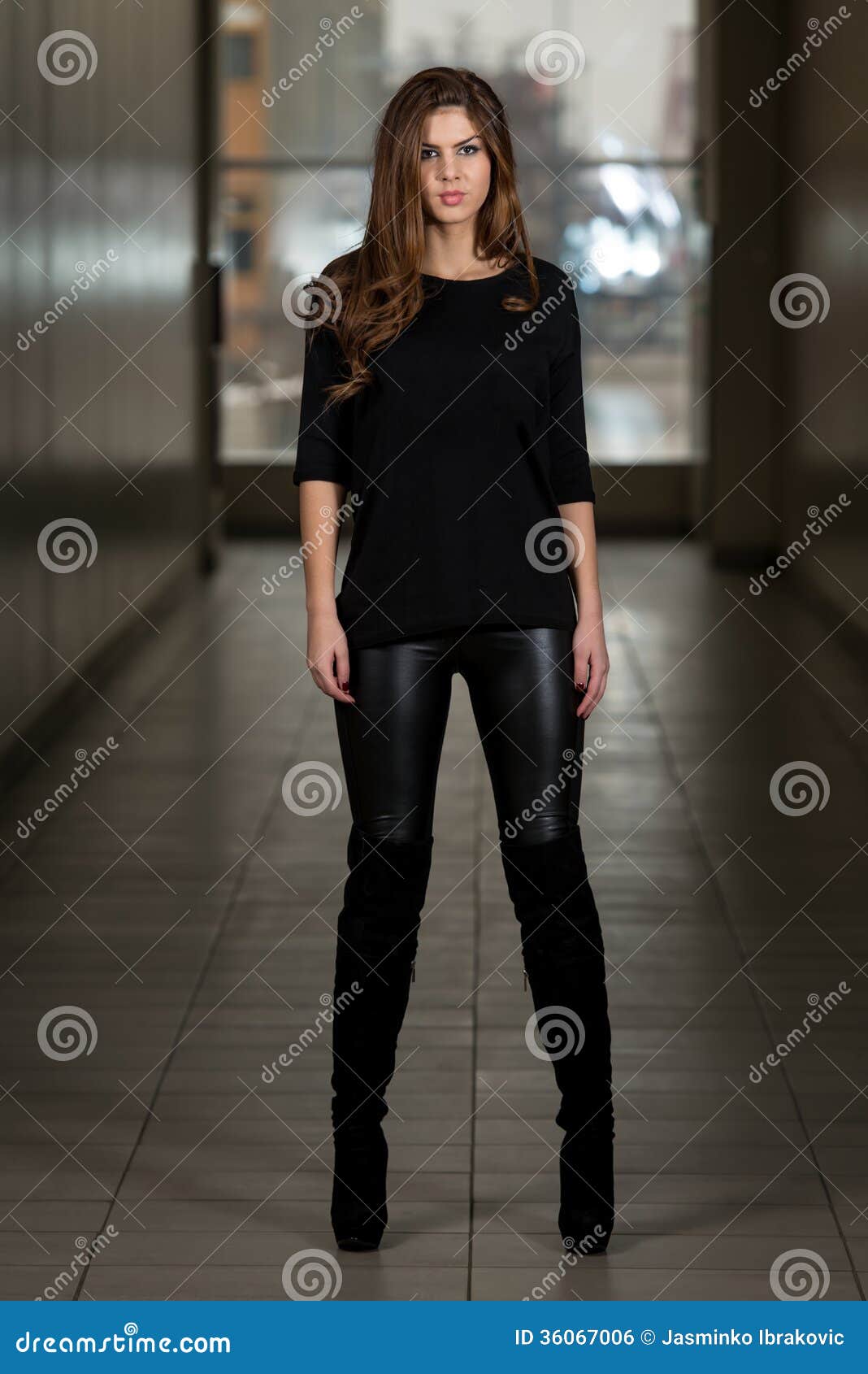 Young Woman Wearing Leather Pants and Long Sleeves Stock Photo - Image ...