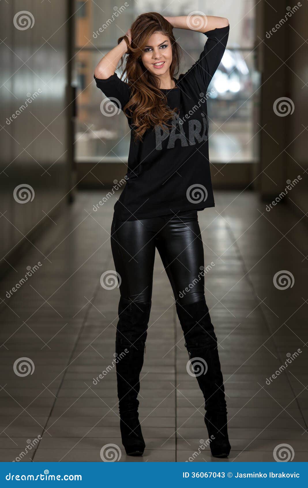 Young Woman Wearing Leather Pants And Long Sleeves Stock Photos - Image ...