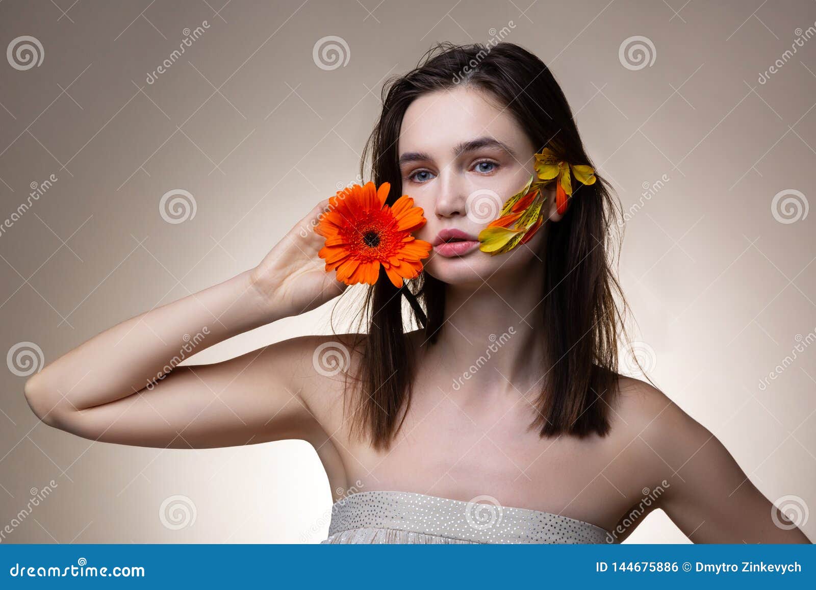 Young Woman Wearing Open Shoulder Dress Loving Flowers Stock Photo ...