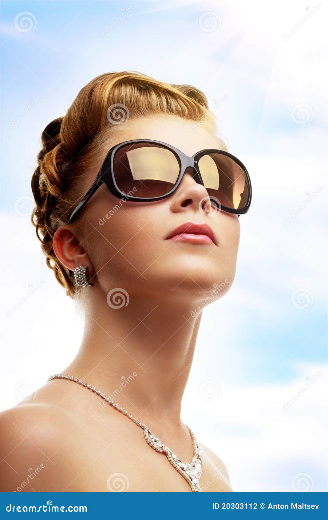 Young Woman Wearing Sunglasses Stock Photo - Image: 20303112