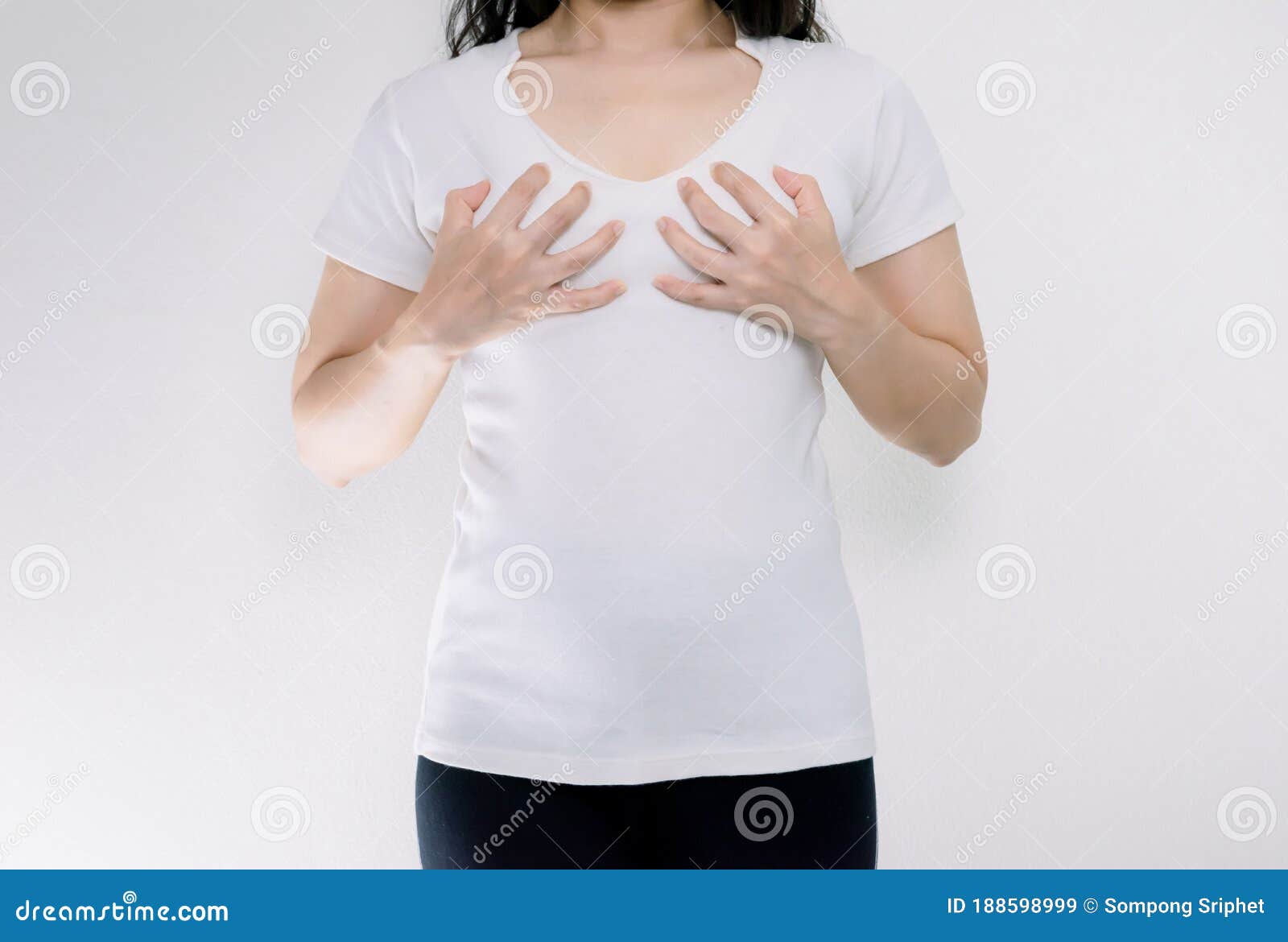 Young Female Body With Small Breasts In White Shirt Stock Photo