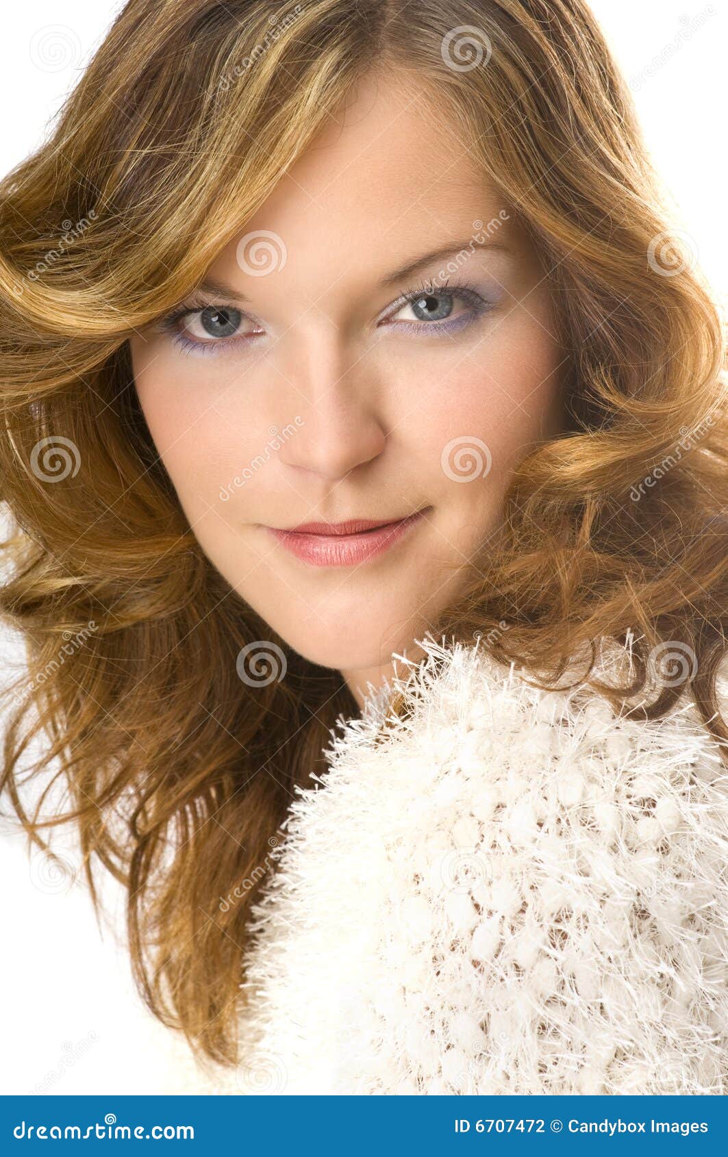 Young woman wearing warm sweater isolated on white background